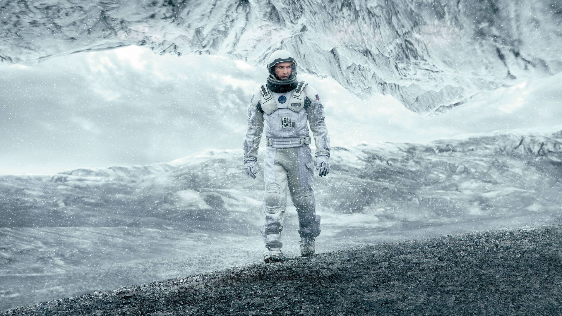 Interstellar Astronaut Cooper On Ice Background