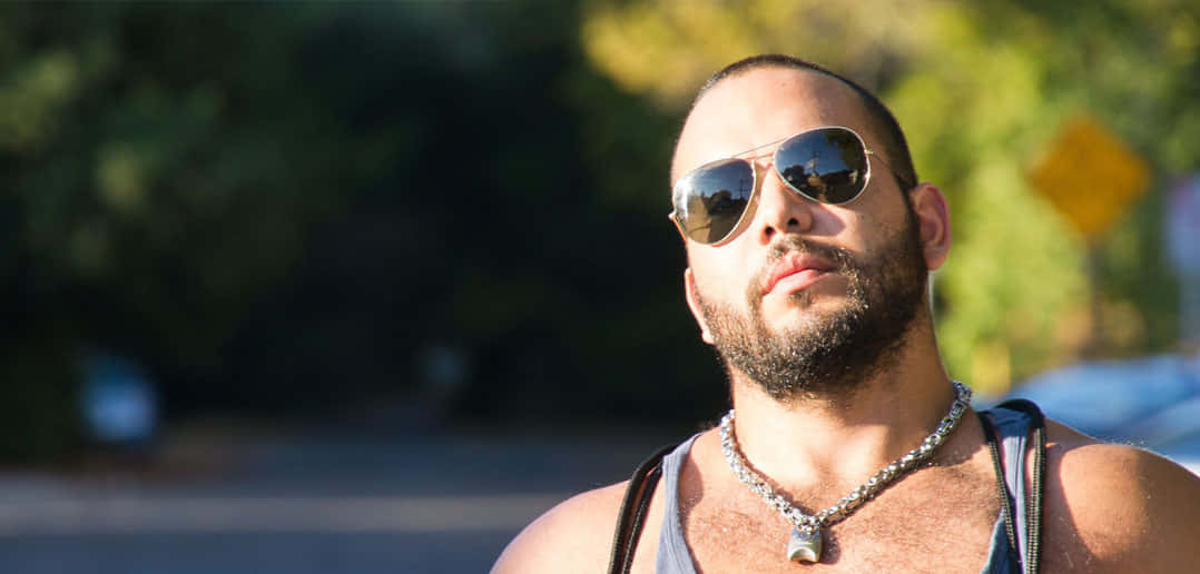 Intimidating Man Wearing Sunglasses Background