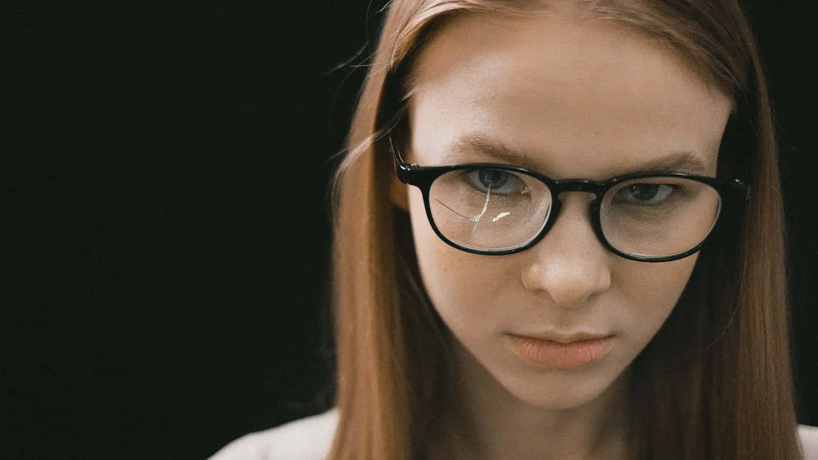 Intimidating Woman With Eyeglasses Background