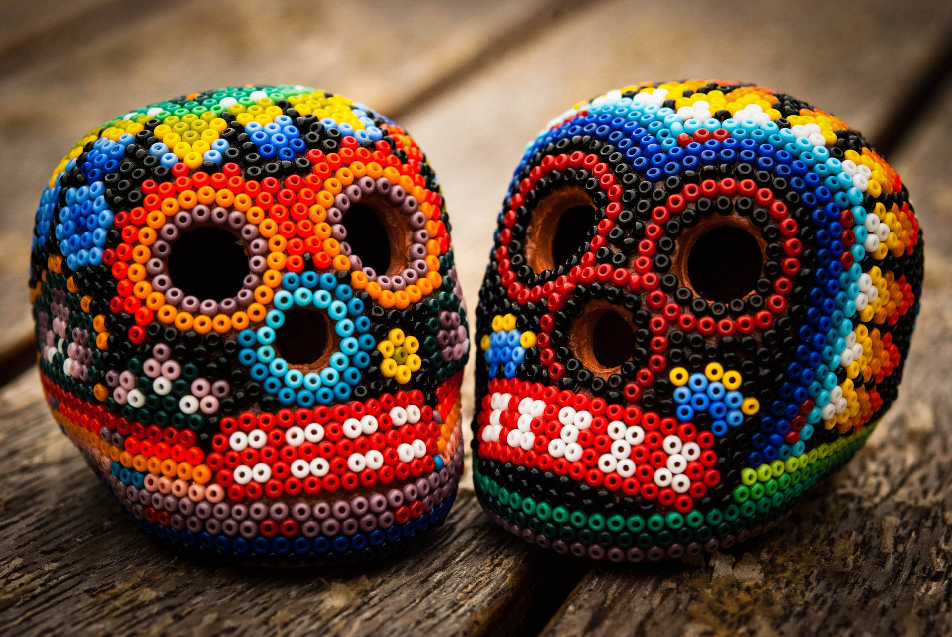 Intricate Chicano Beaded Skulls Background