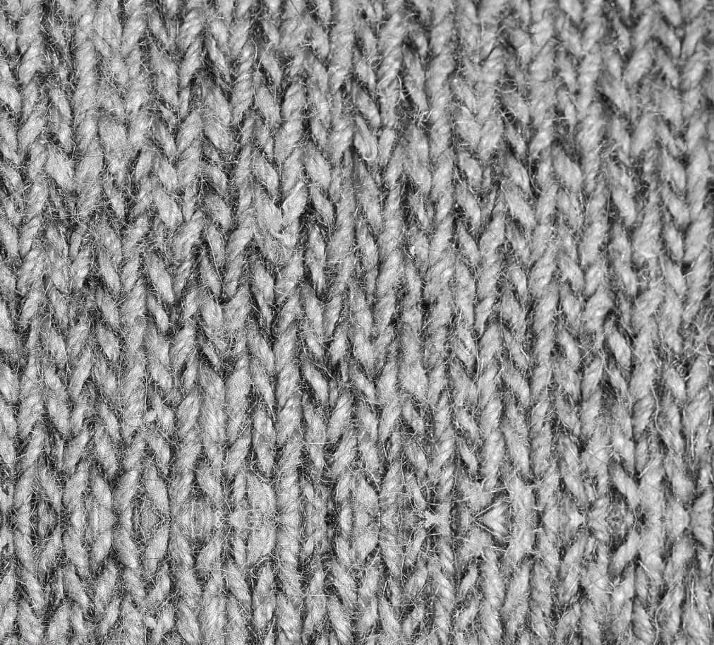 Intricate Weave Of A Gray Sweater