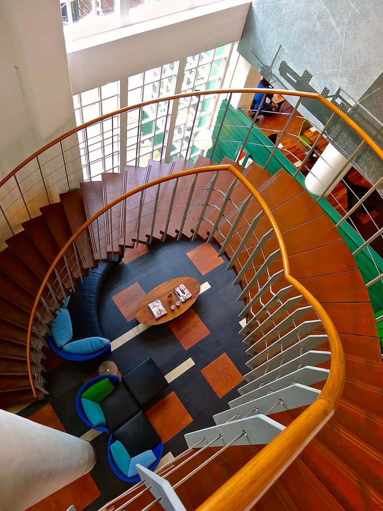 Intricate Wooden Staircase In Inntel Hotel Zaandam Background