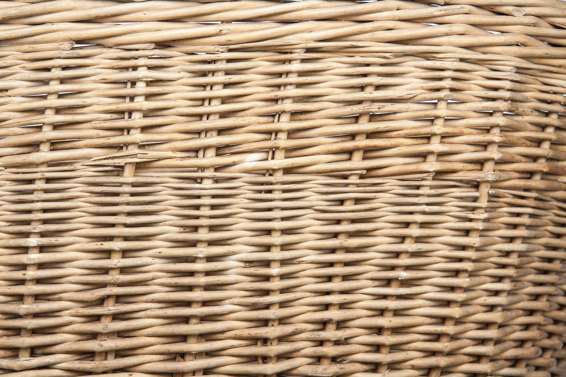 Intricately Handwoven Pliable Wicker Basket Background