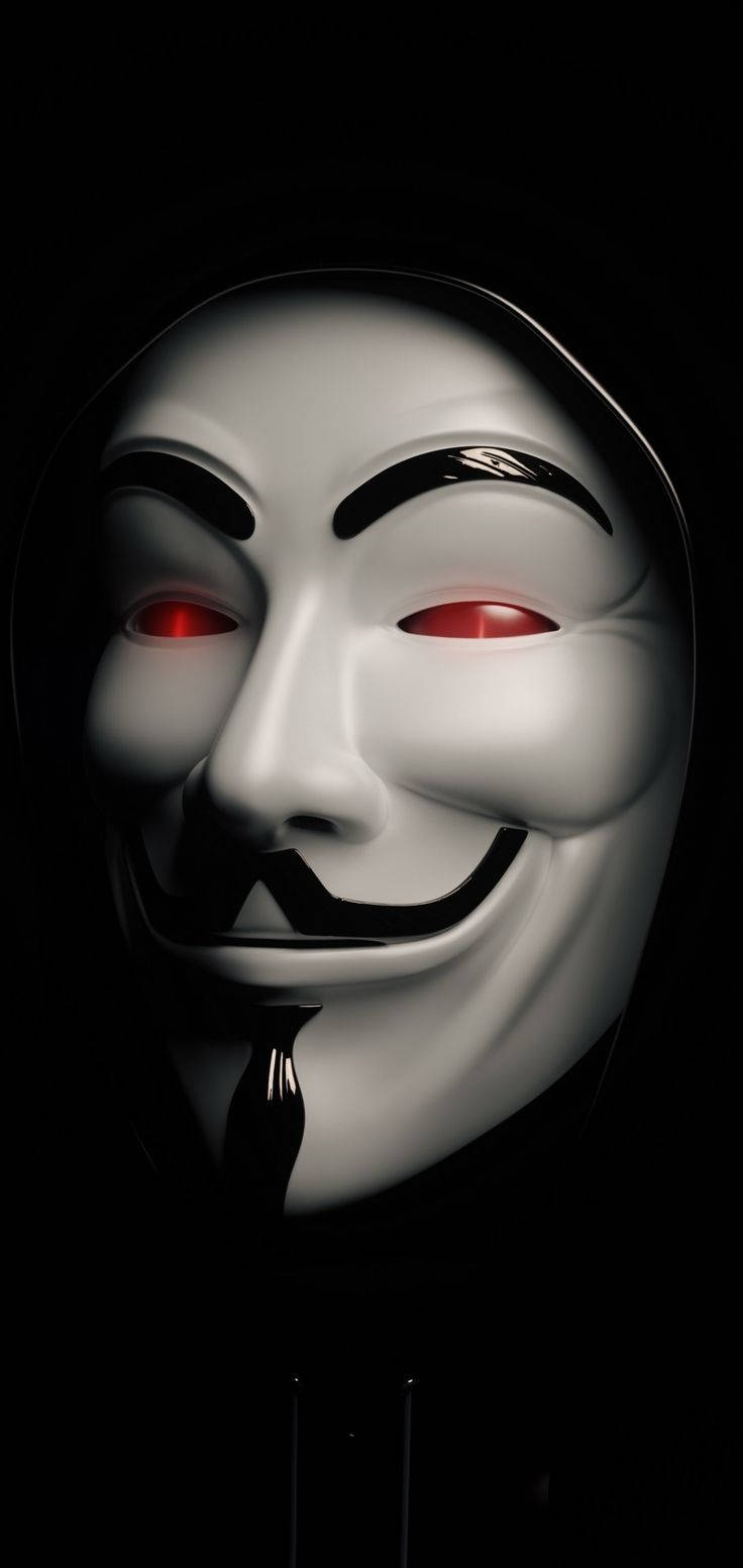 Intriguing Man In Guy Fawkes Mask Using Smartphone Background