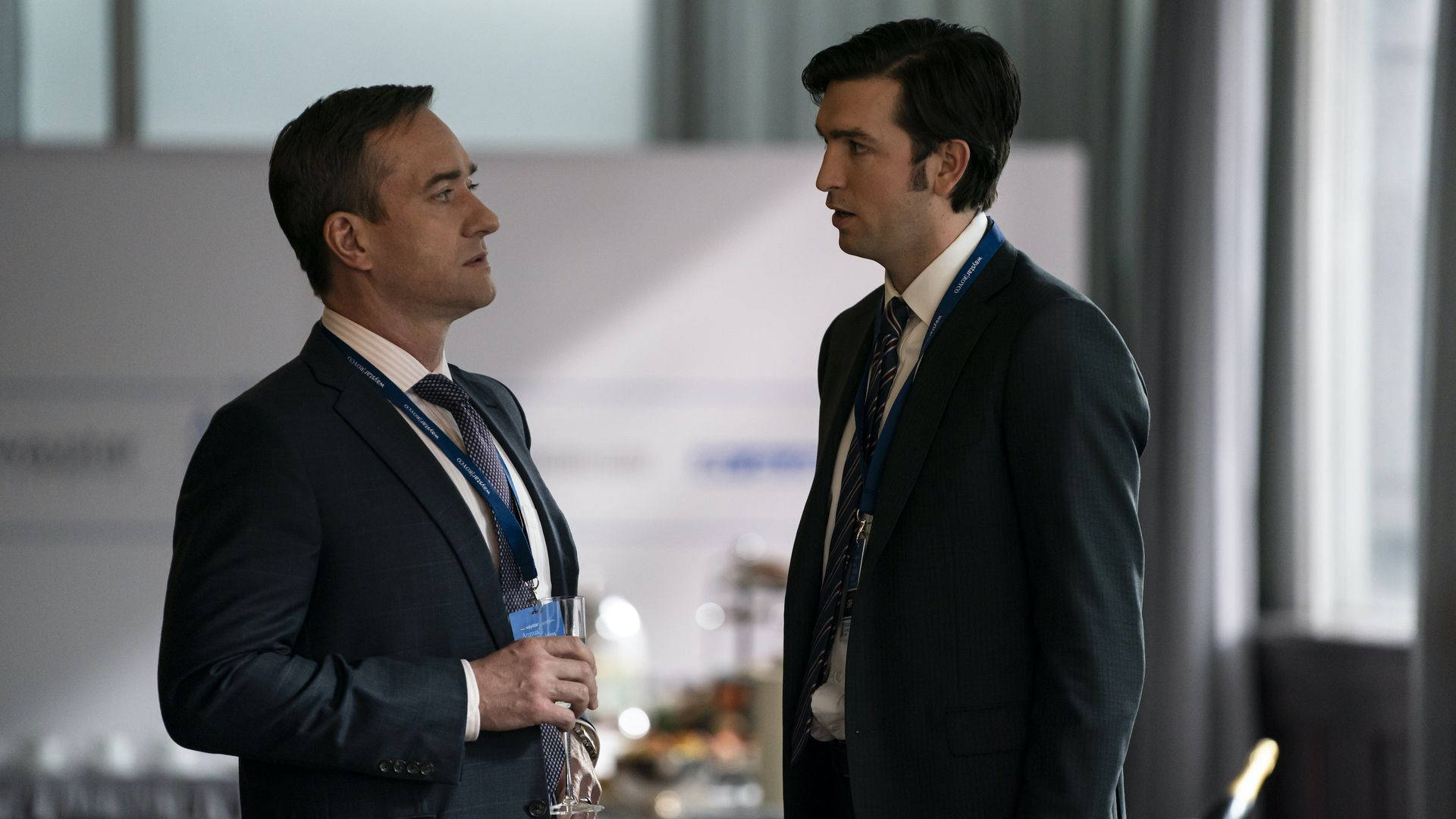 Intriguing Pic From Succession Featuring Characters Greg And Tom Background