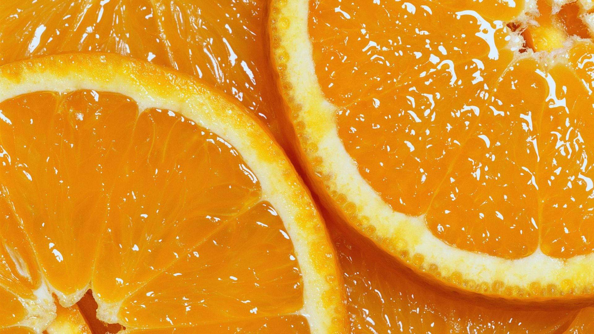 Invigorating Freshness: High-quality Image Of A Juicy Orange Fruit Background
