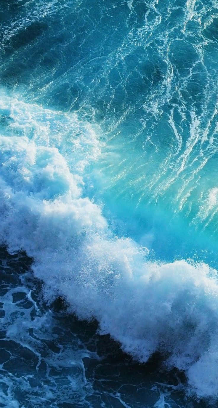 Ios 1 Blue Crashing Waves Background