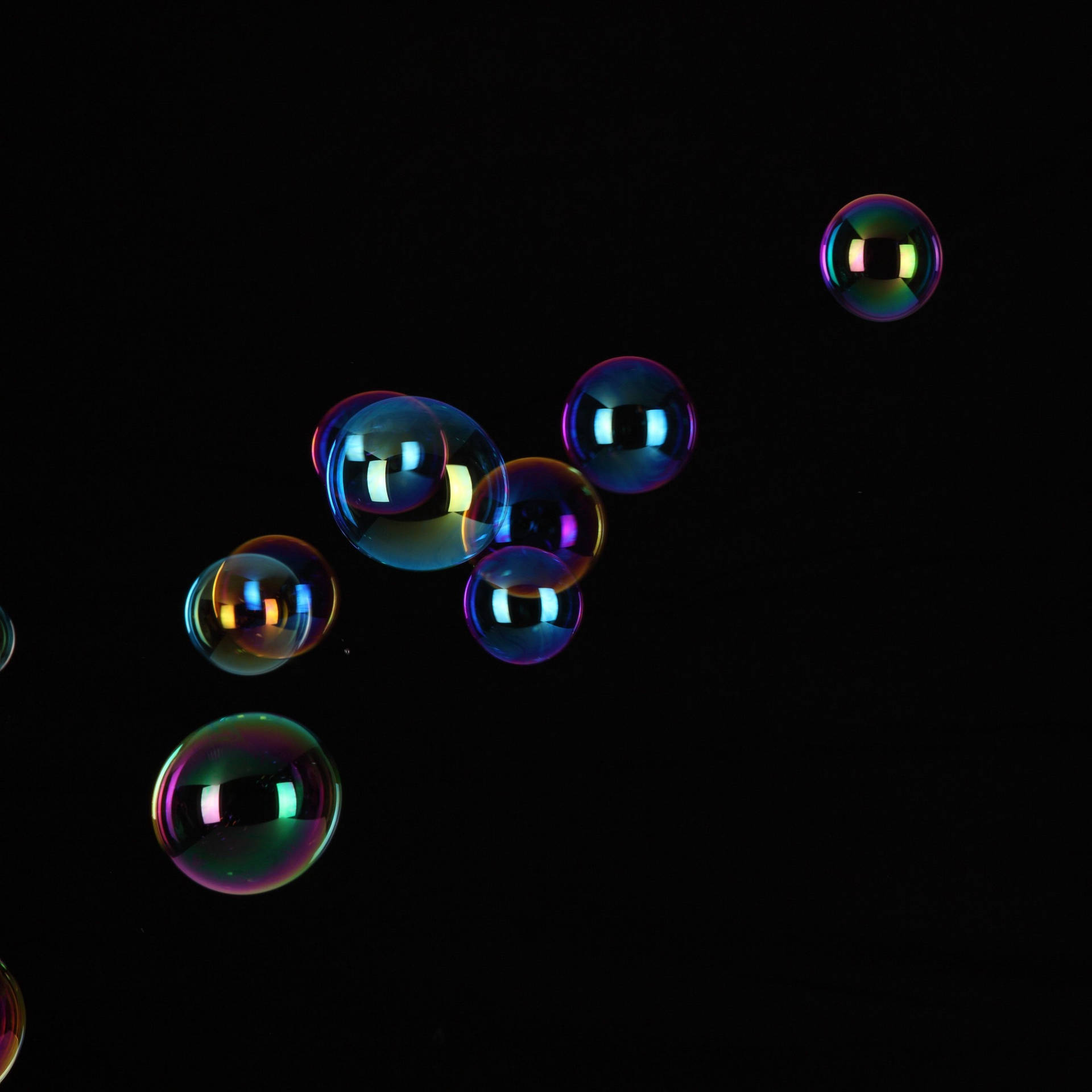 Ipad Pro Floating Bubbles On Black Background