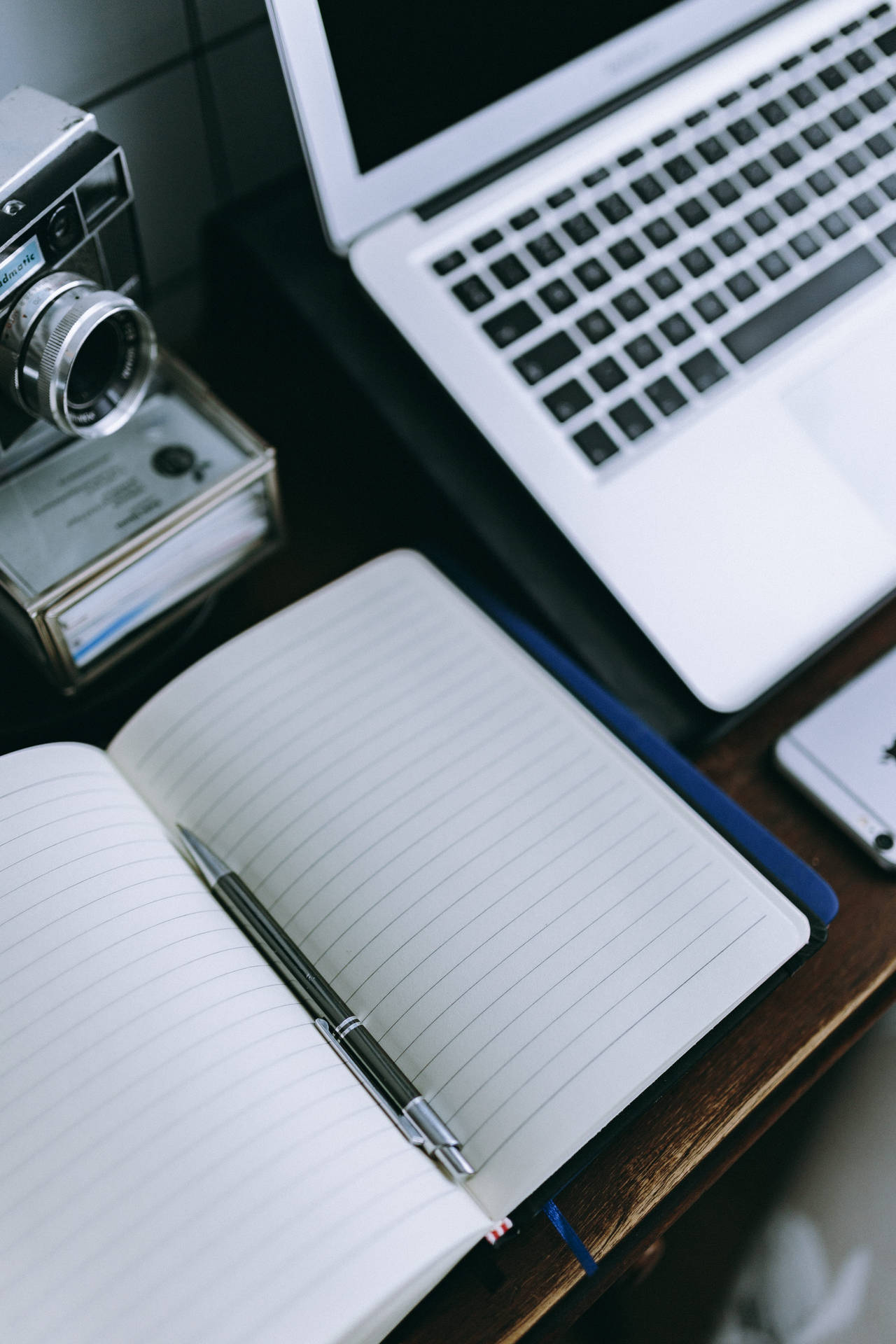 Iphone Desk With Journal And Pen Background