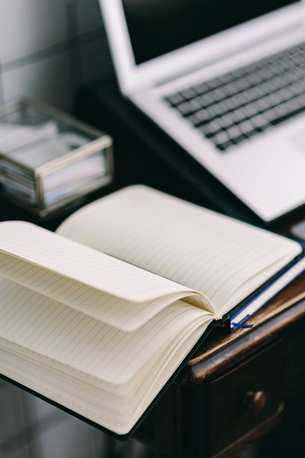 Iphone Desk With Open Journal Background