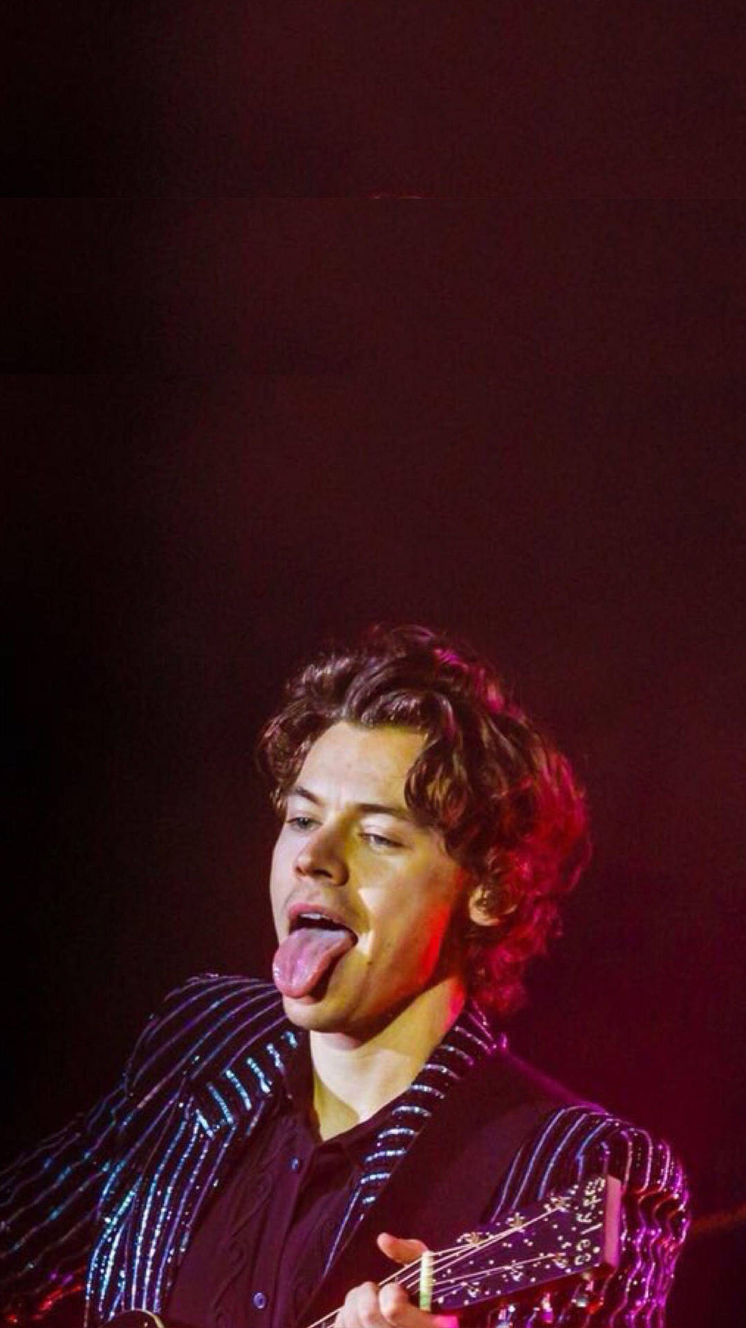 Iphone Harry Styles Sticking Out His Tongue Background