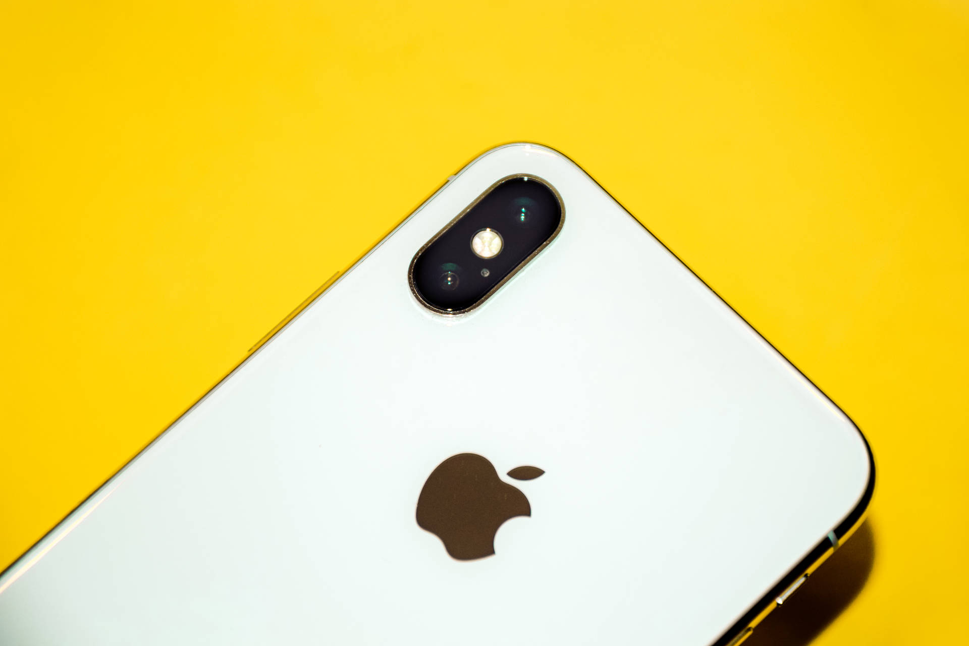 Iphone Xs Max On Yellow Background