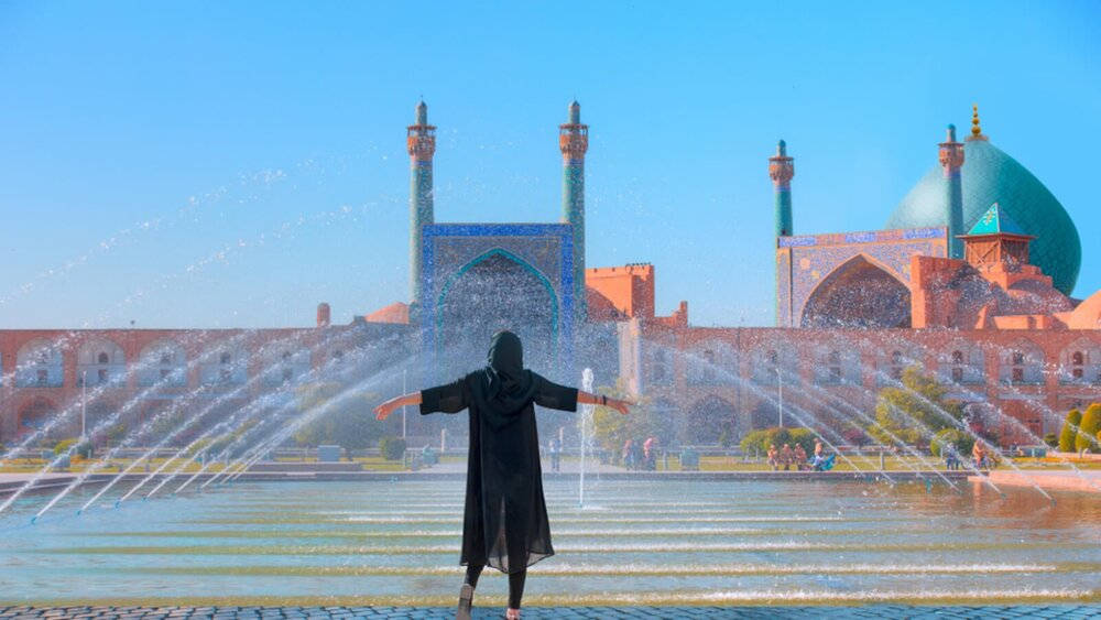 Iran Woman By The Fountain