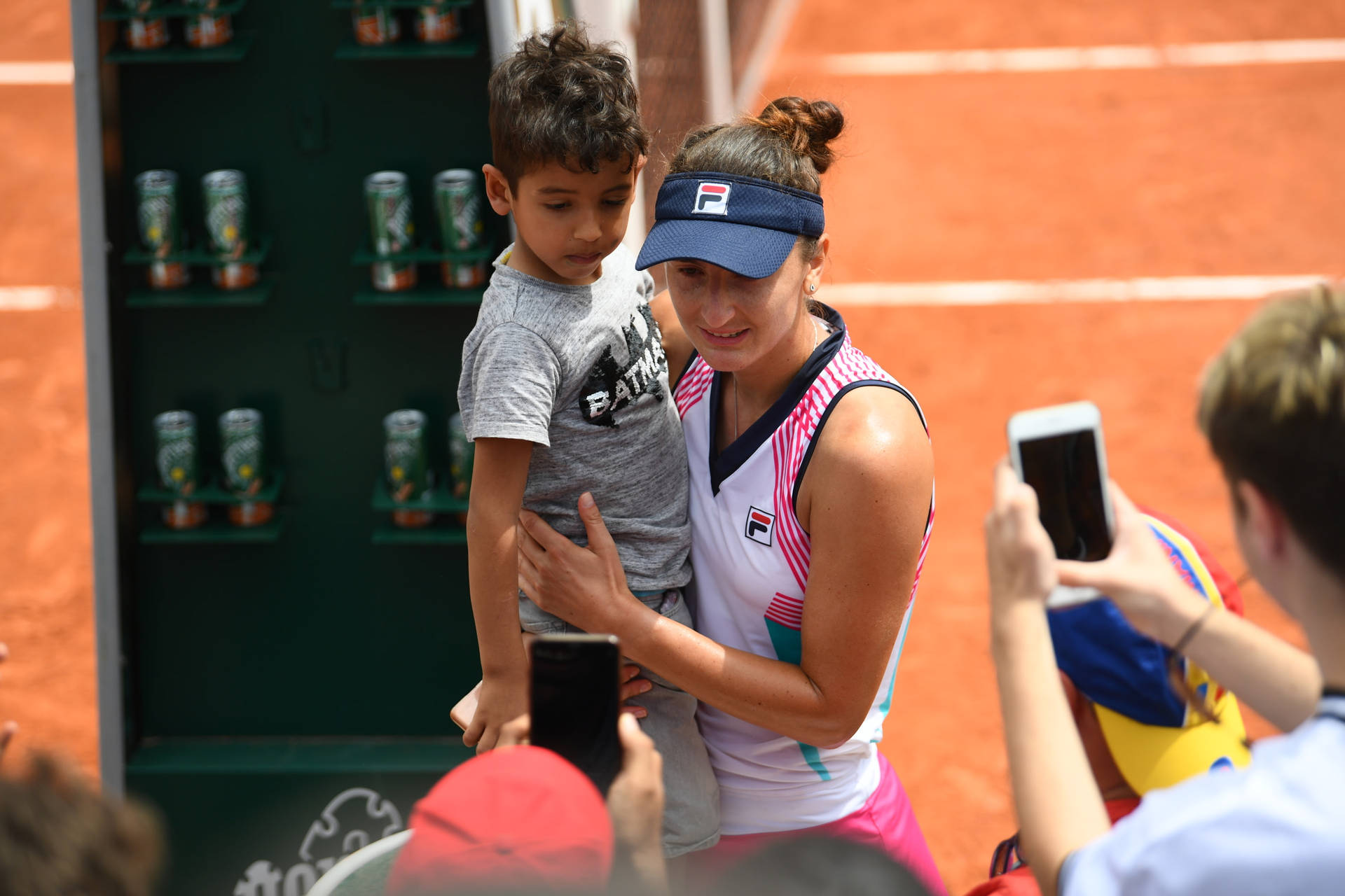 Irina-camelia Begu Carrying Kid Background