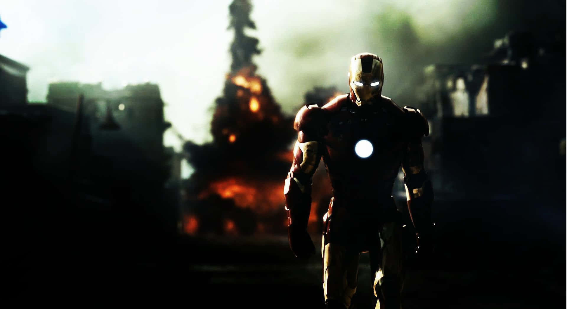 Iron Man Standing Amidst Destruction Background