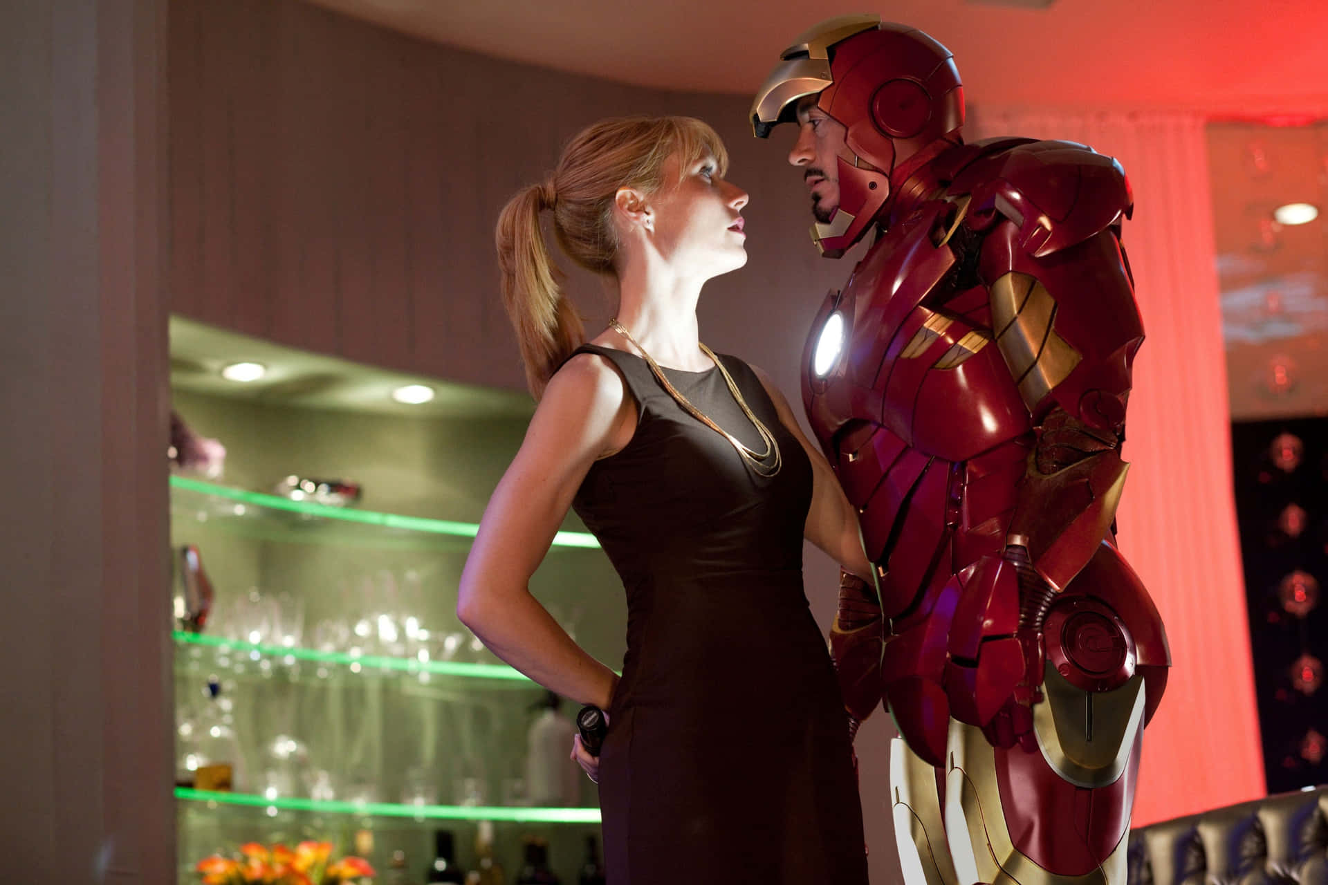 Iron Manand Woman Faceto Face Background