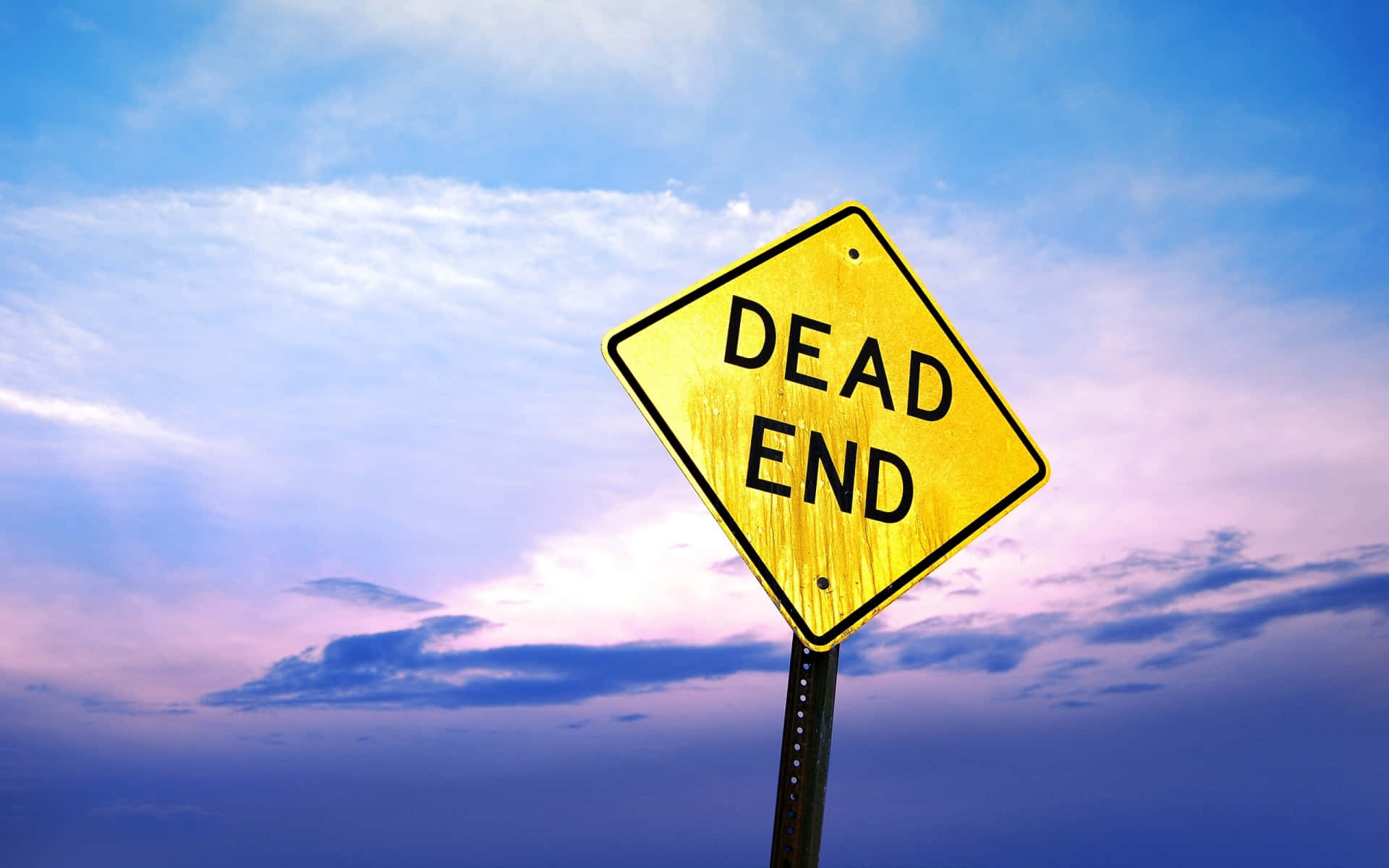 Ironic Sign Board Reminding The Dead End Background