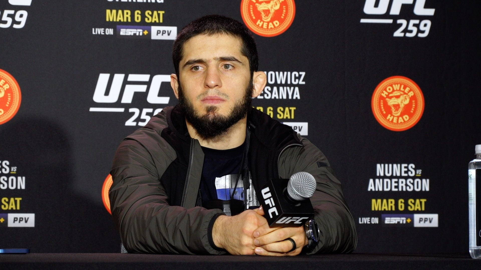 Islam Makhachev During A Press Con Background