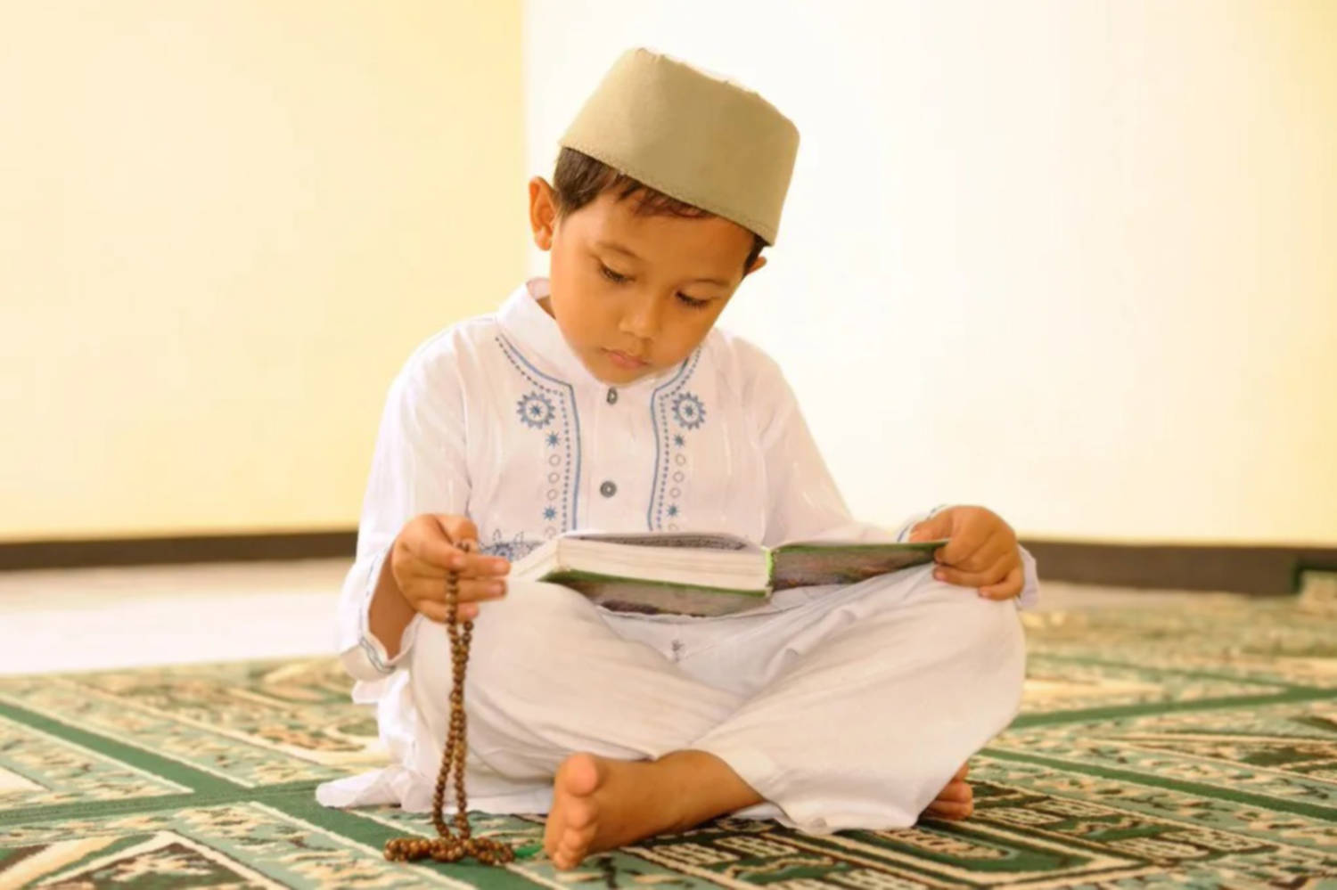 Islamic Boy Reading Quran Background