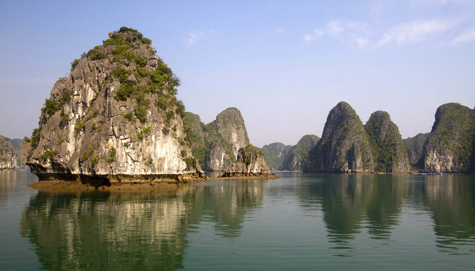 Islands Reflecting On Halong Bay's Water Background