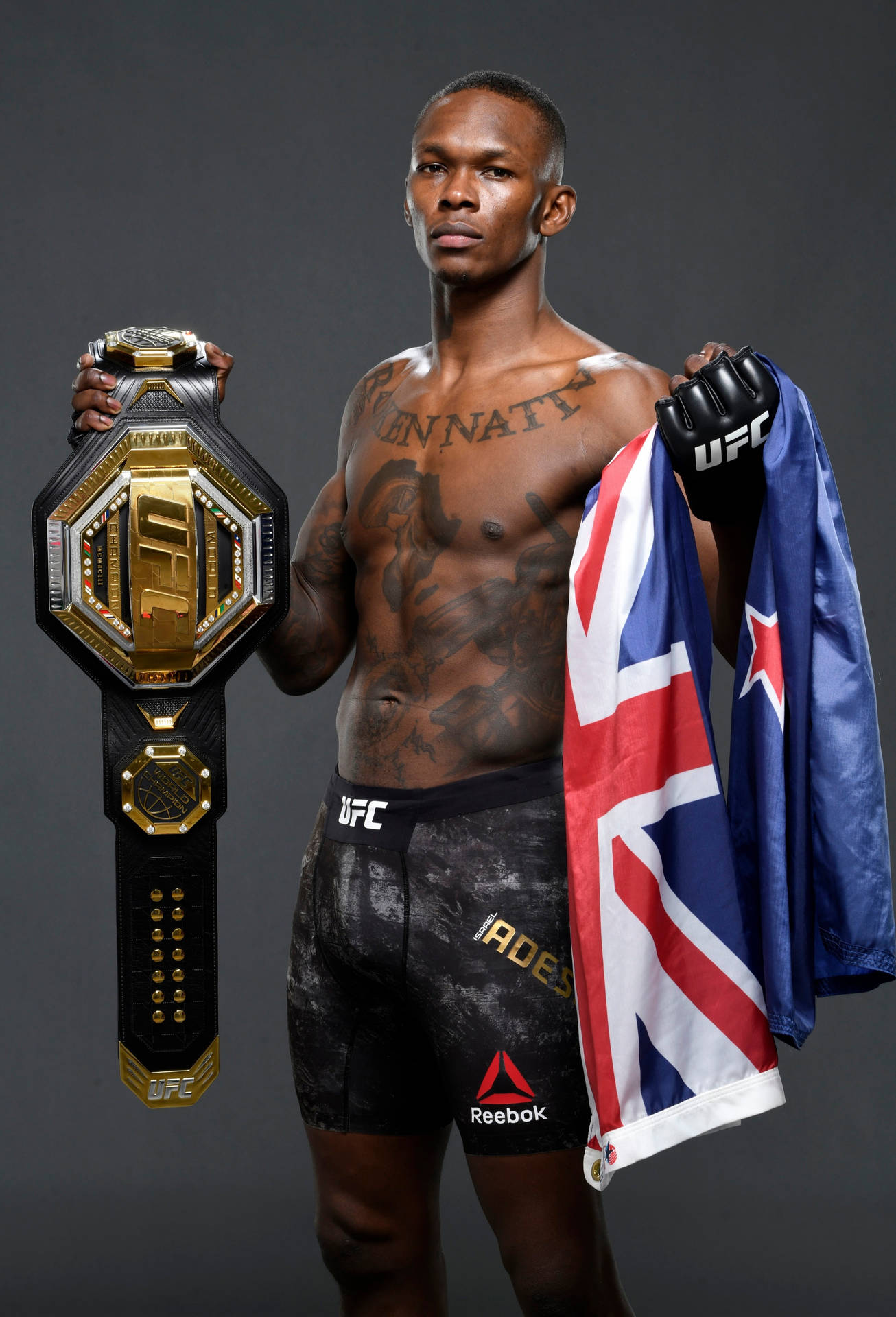 Israel Adesanya With Flag And Belt Background