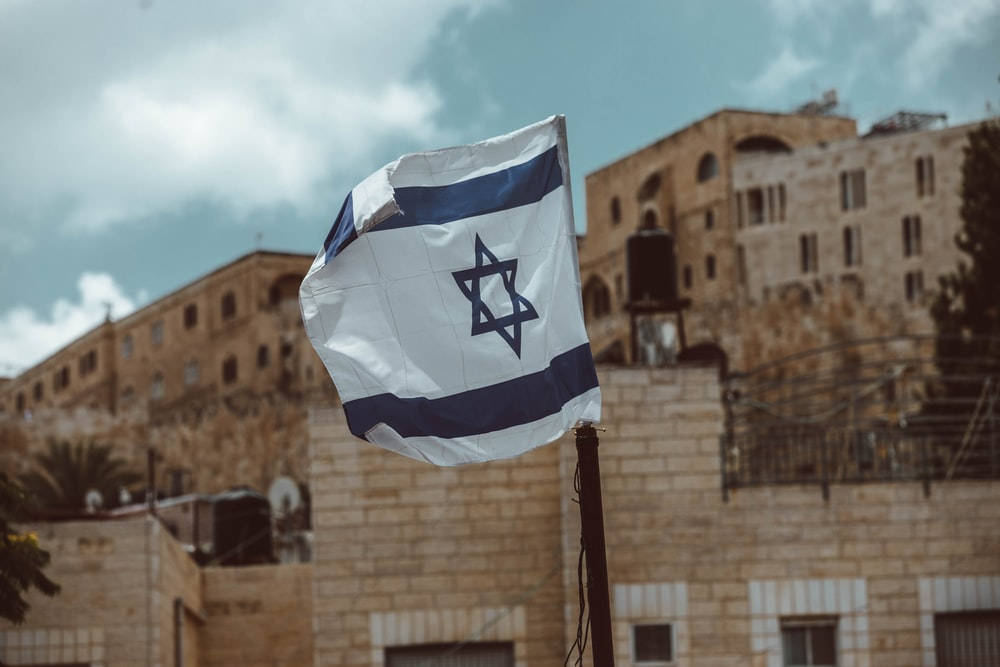 Israel Flag On Rusty Pipe Background