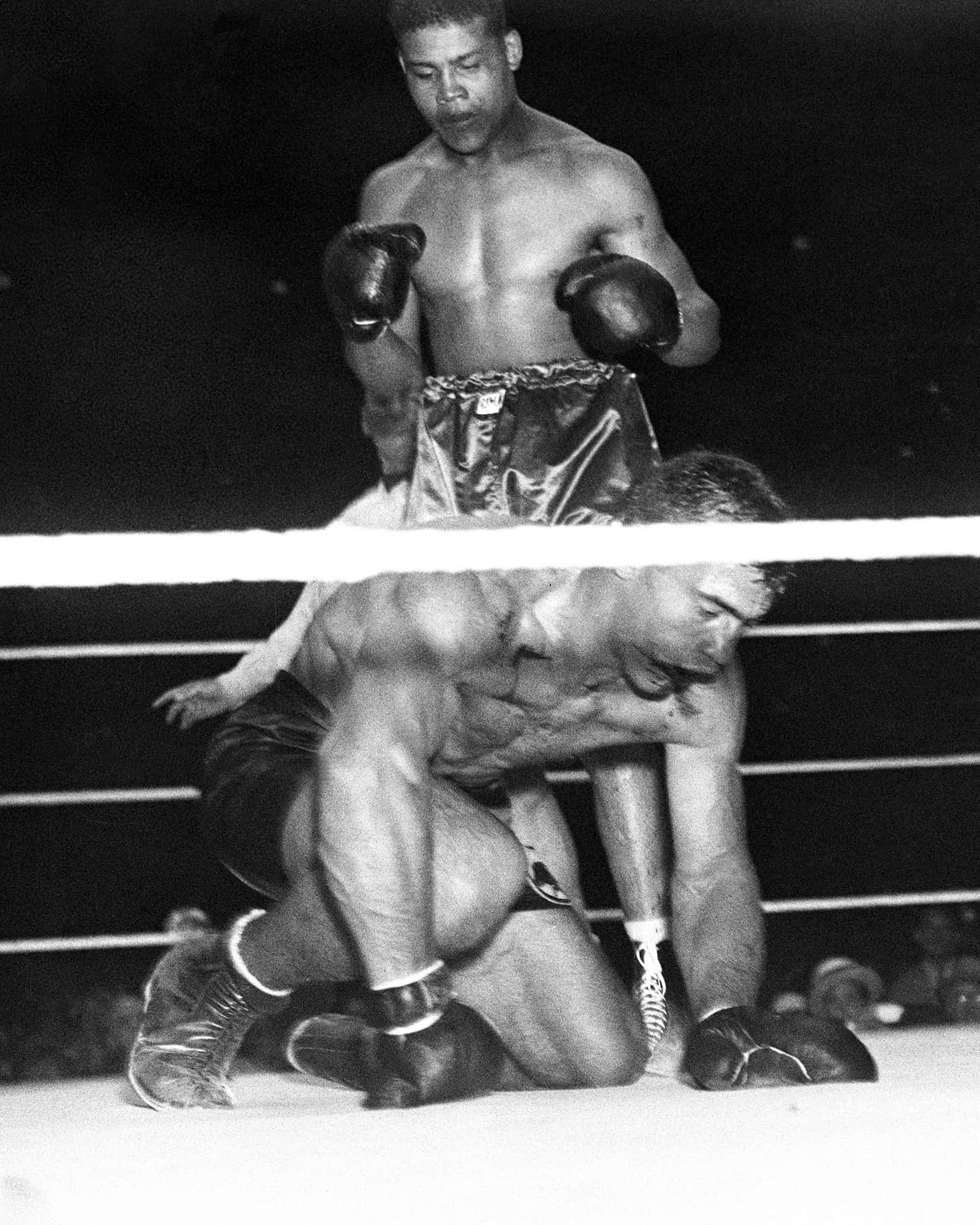 Italian Boxer Primo Carnera Against Joe Louis Background