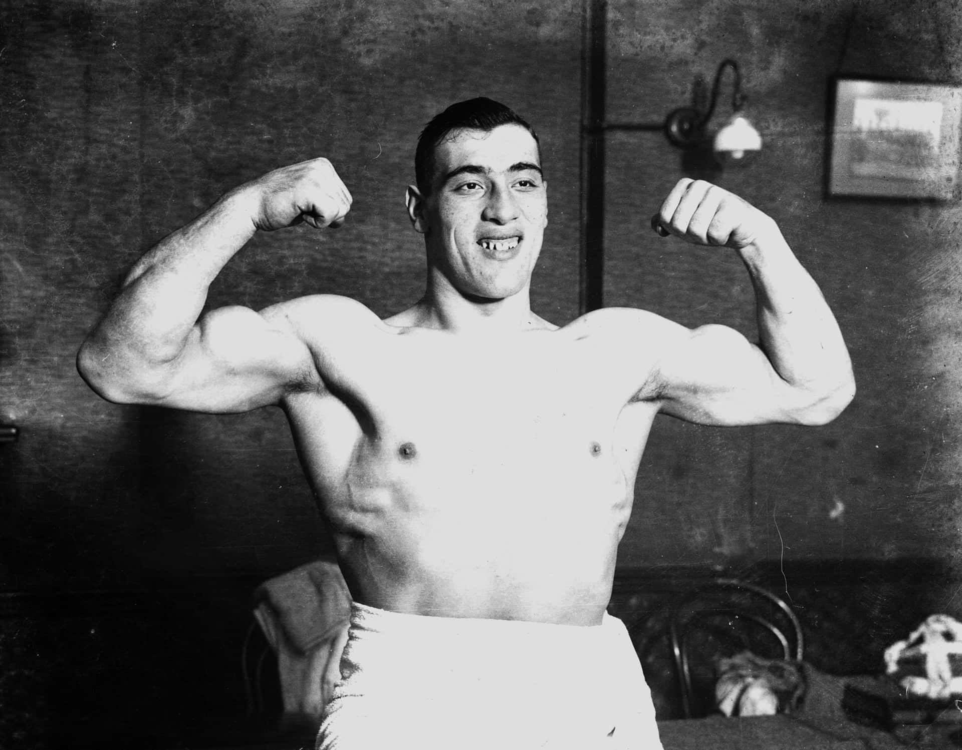 Italian Boxer Primo Carnera Flexing For People Disc