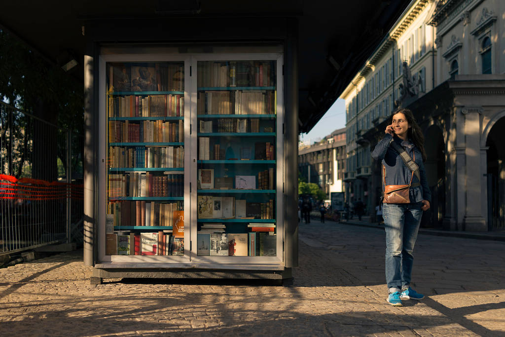 Italian Girl By Bookcase