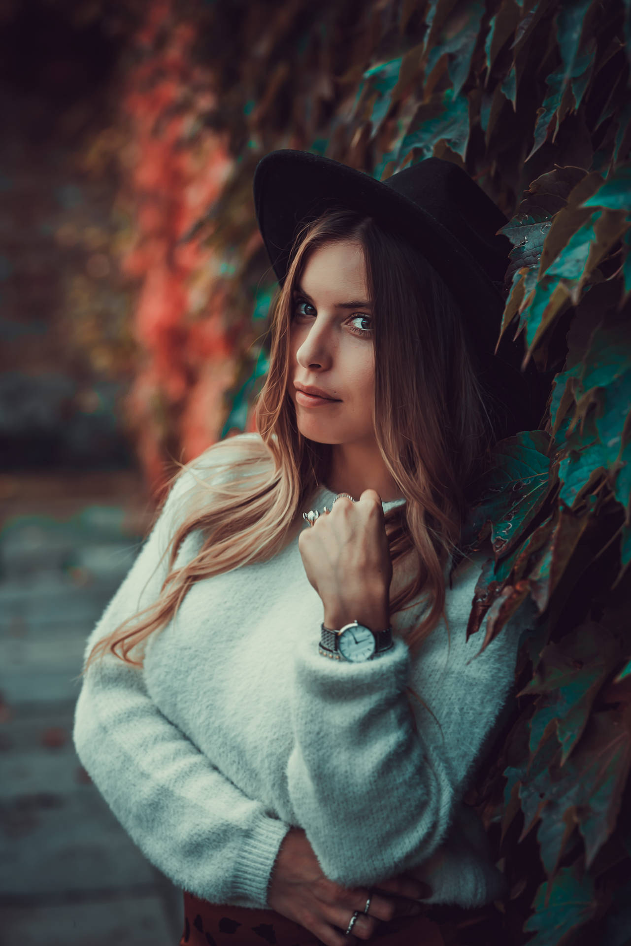 Italian Girl With Wall Of Leaves Background