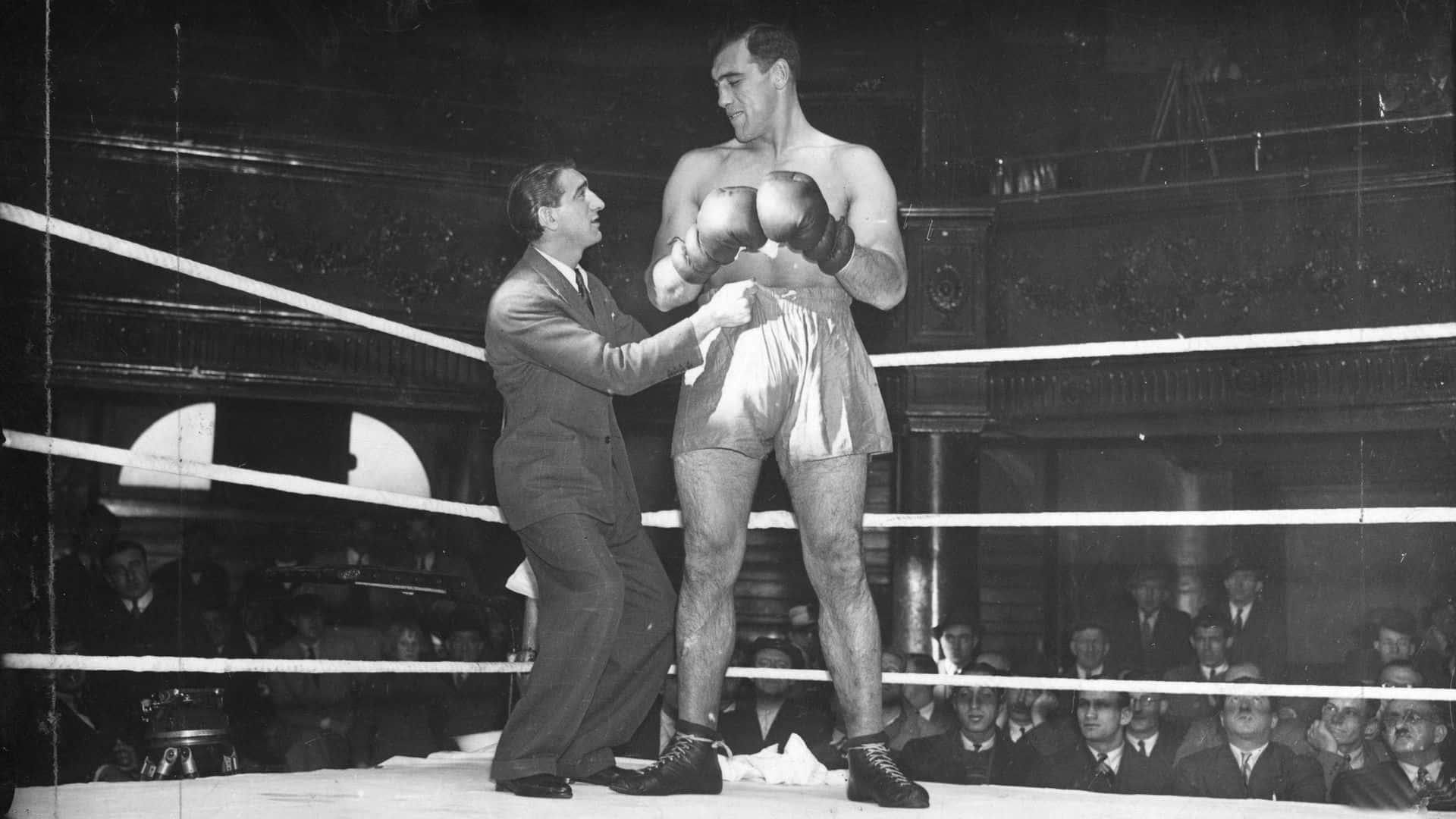 Italian Professional Boxer Primo Carnera At The Ring Venue Background