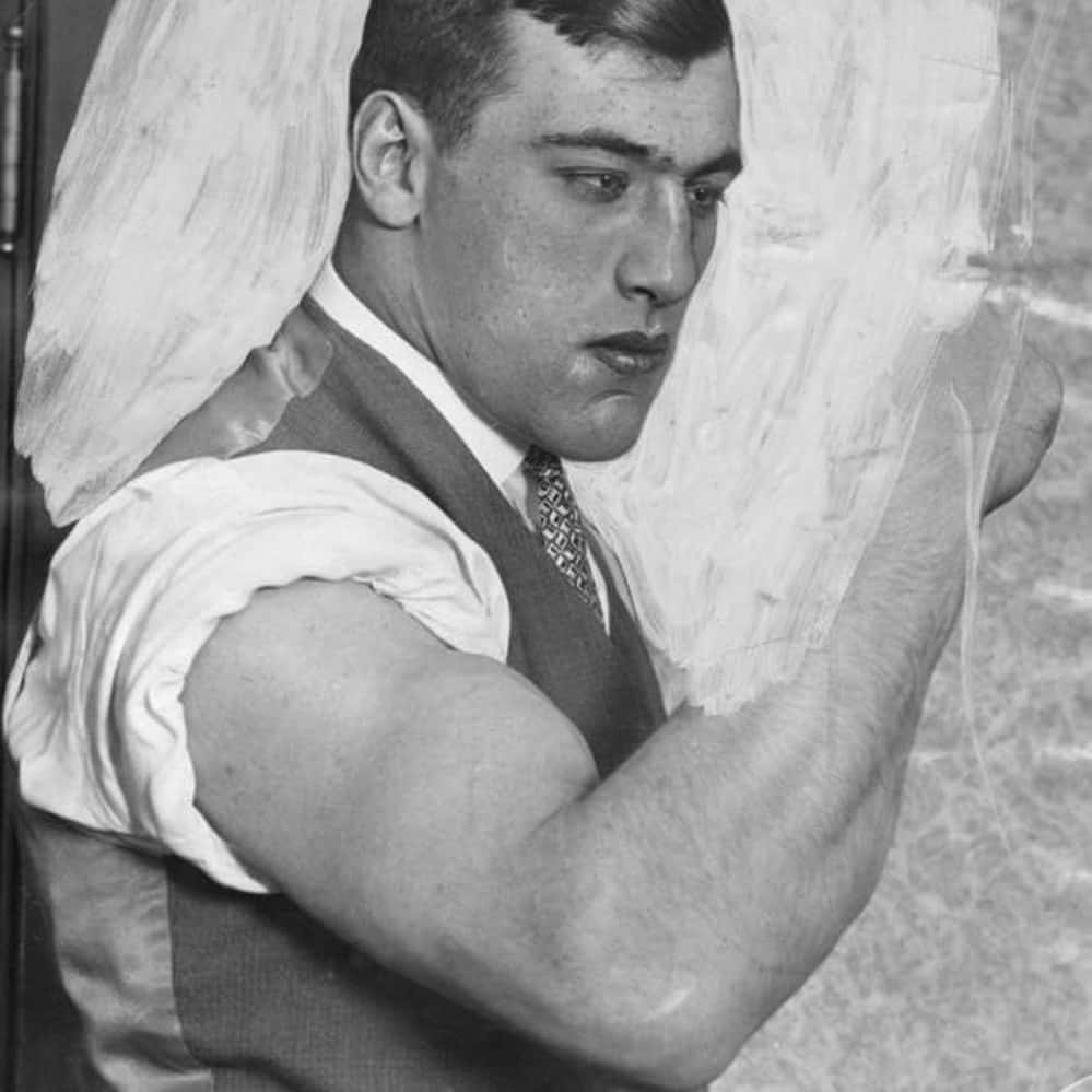 Italian Professional Boxer Primo Carnera Flexing His Biceps
