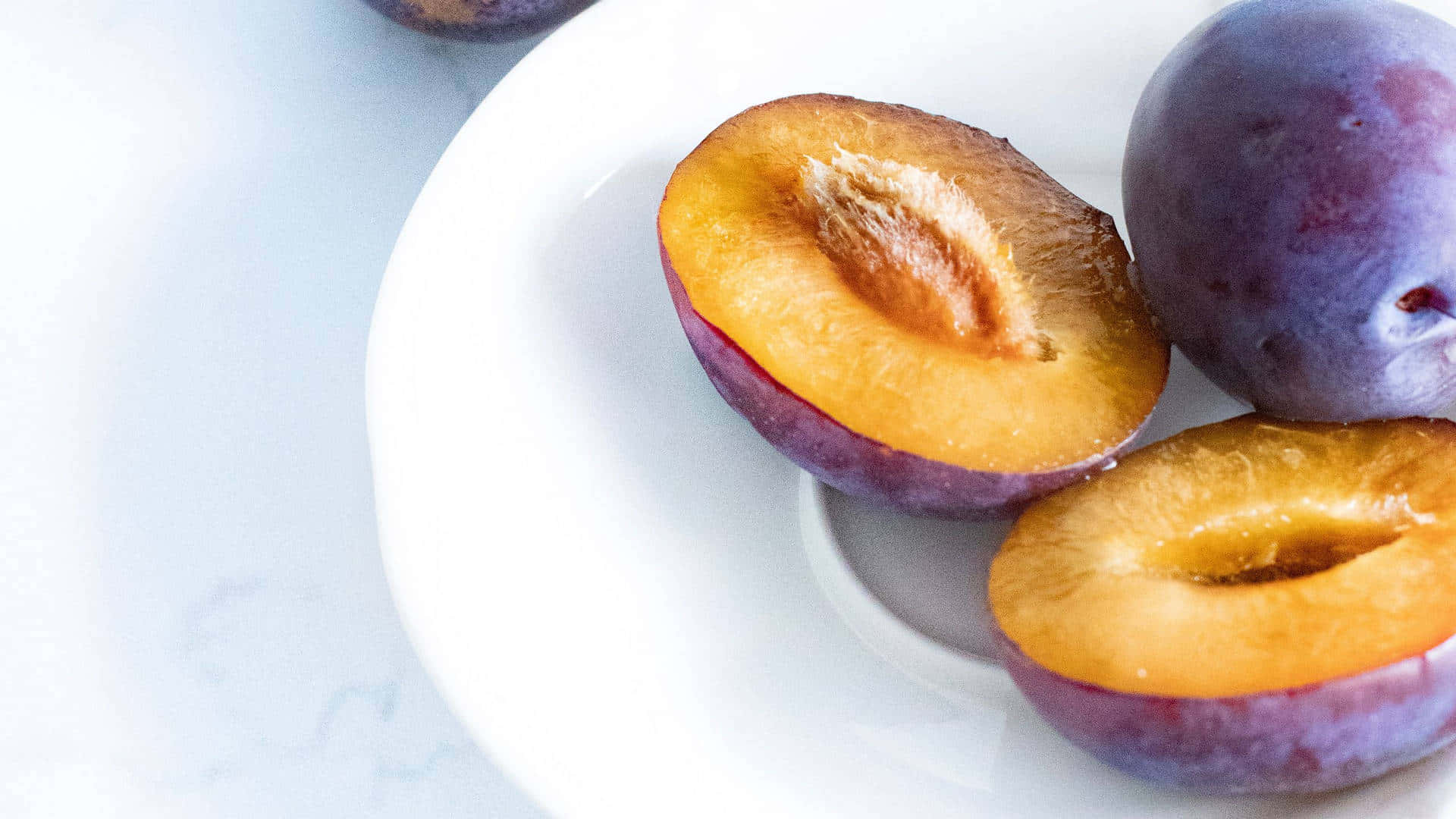 Italian Prune Plum Sliced Fruits Background