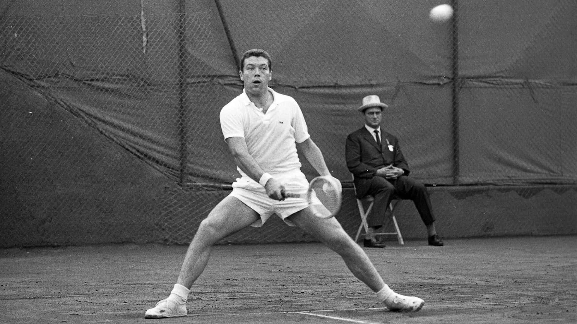 Italian Tennis Player Nicola Pietrangeli On Tennis Court Background
