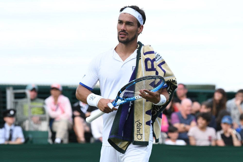 Italian Tennis Sensation Fabio Fognini In Action Background