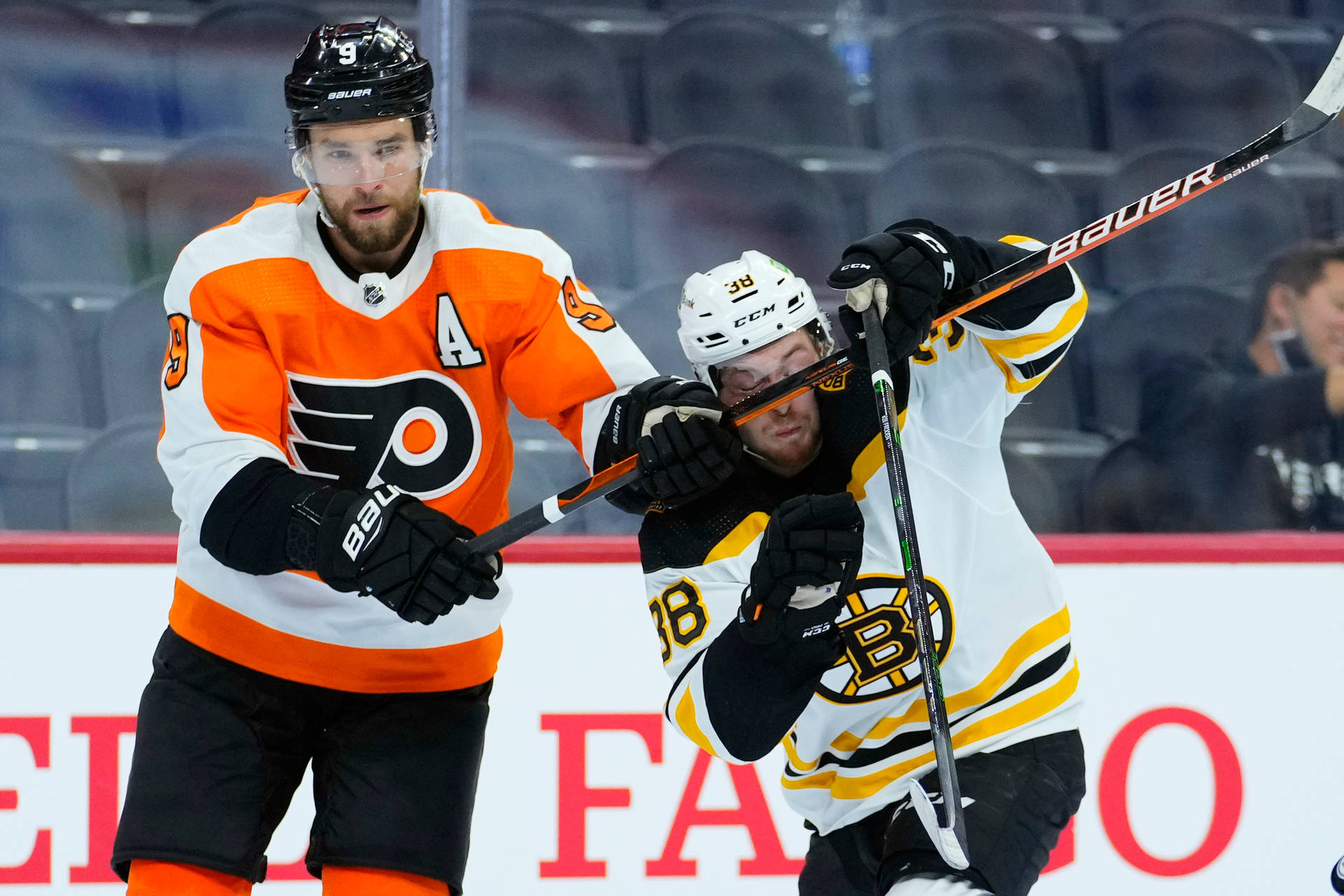 Ivan Provorov In Action Against Boston Bruins Background