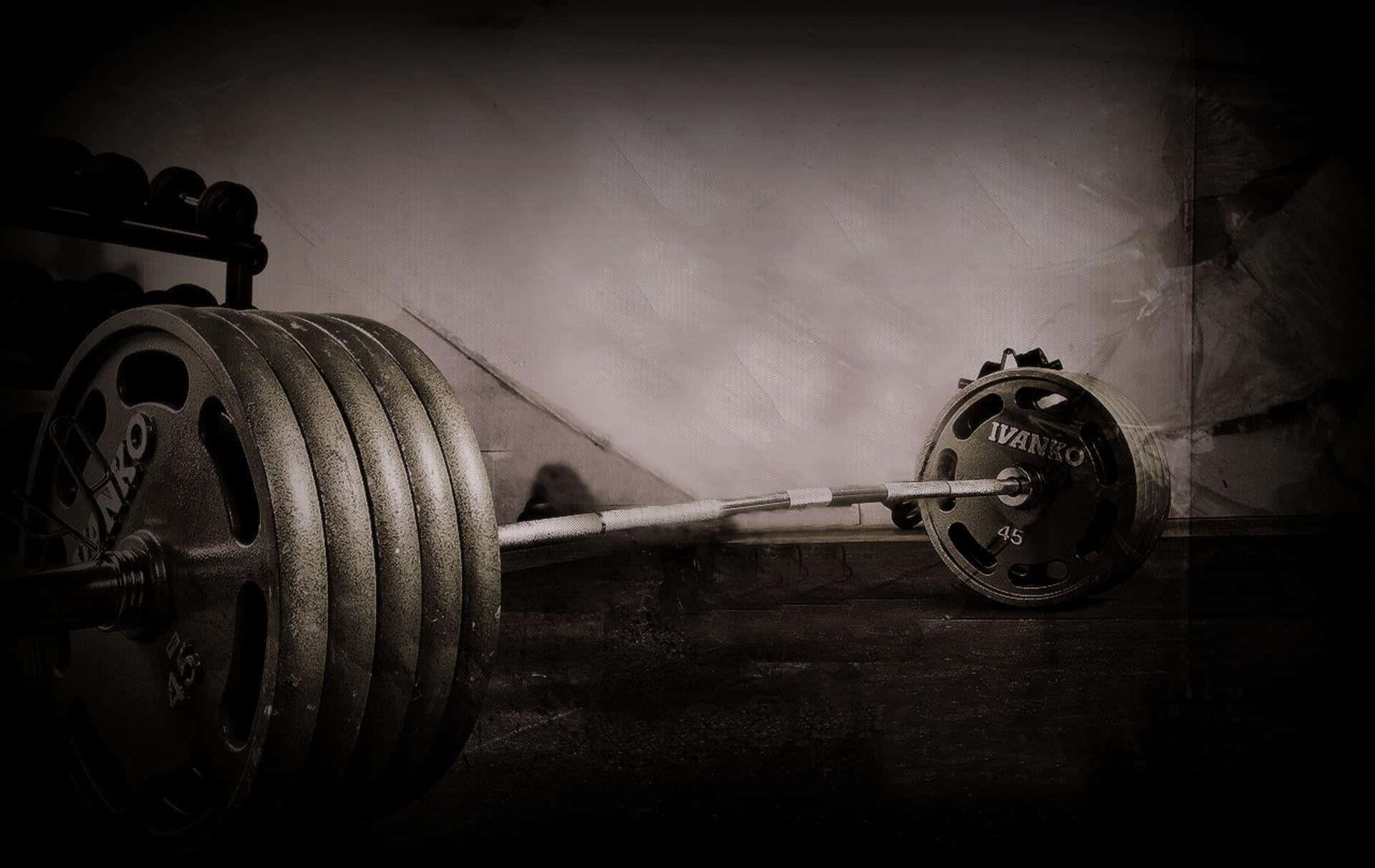 Ivanko Barbell Plates For Weight Training Background