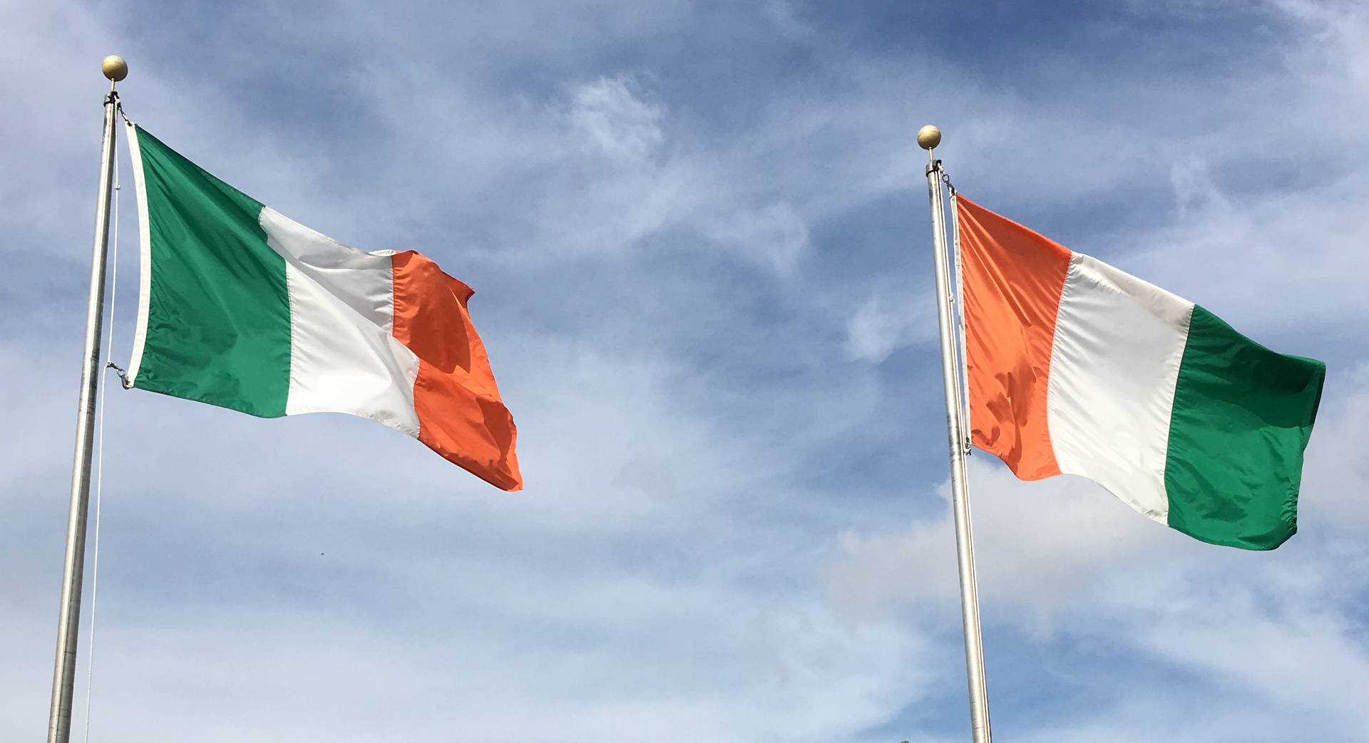 Ivory Coast And Ireland Flag Background