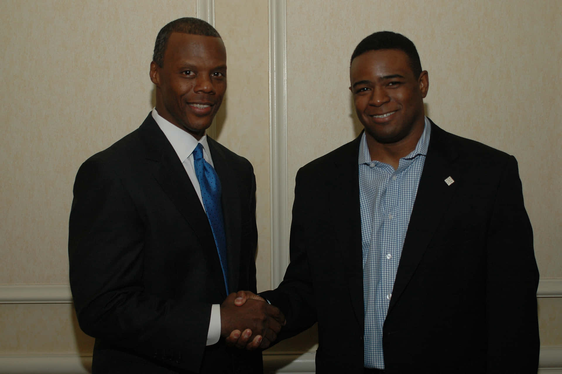 J.c. Watts Doing Handshake Background