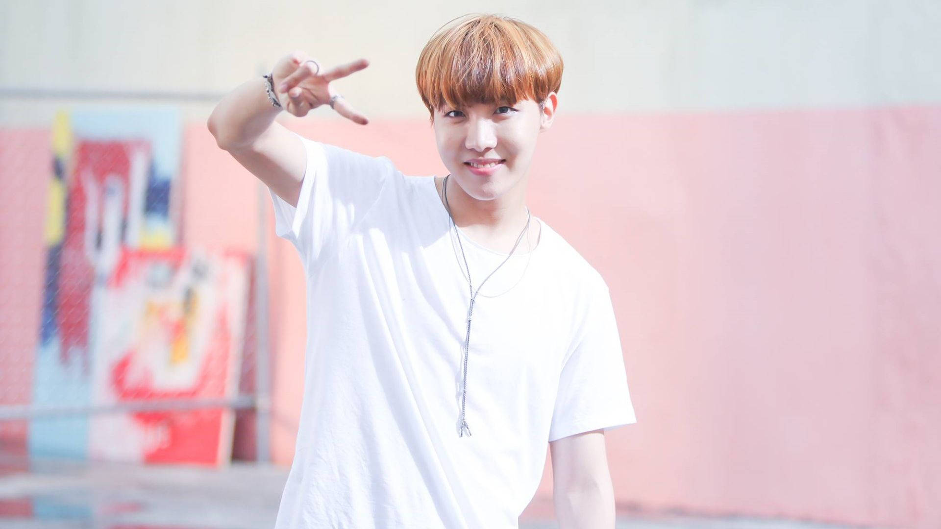 J-hope Doing Peace Sign Background