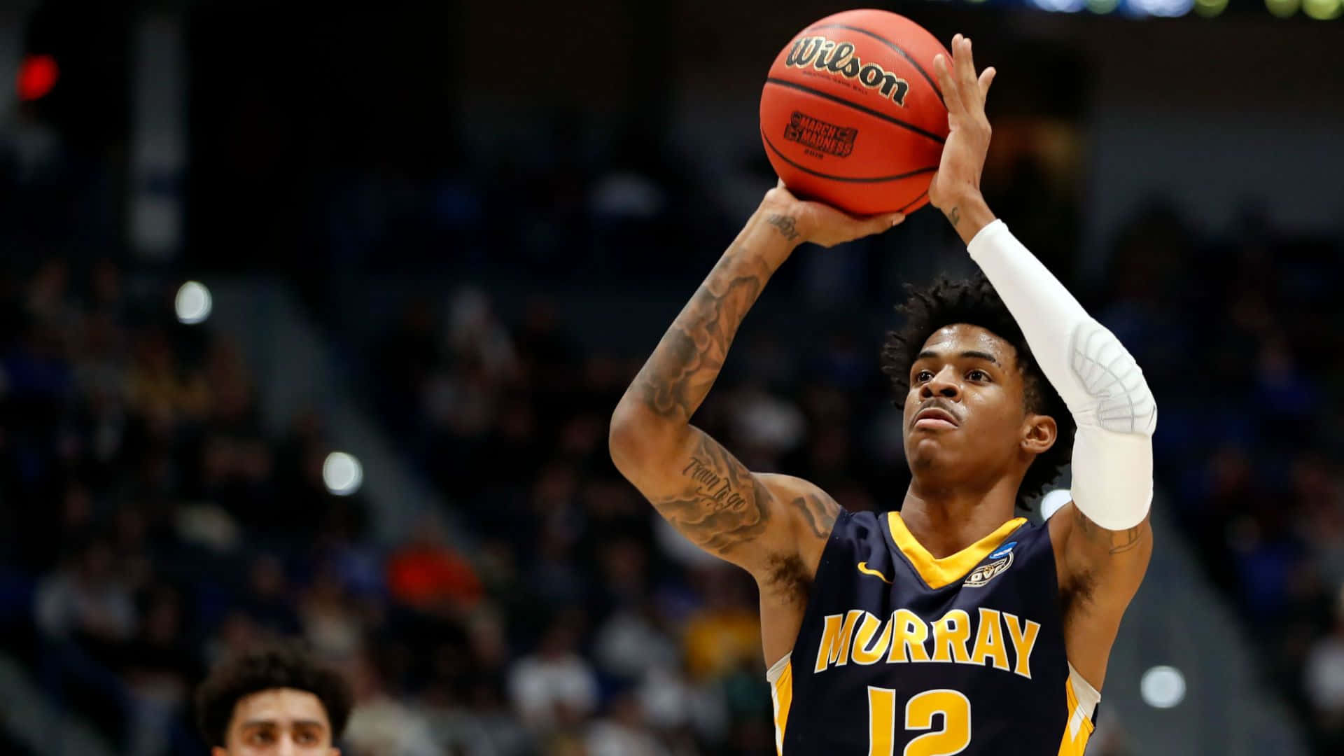 Ja Morrant In His Shooting Position Background