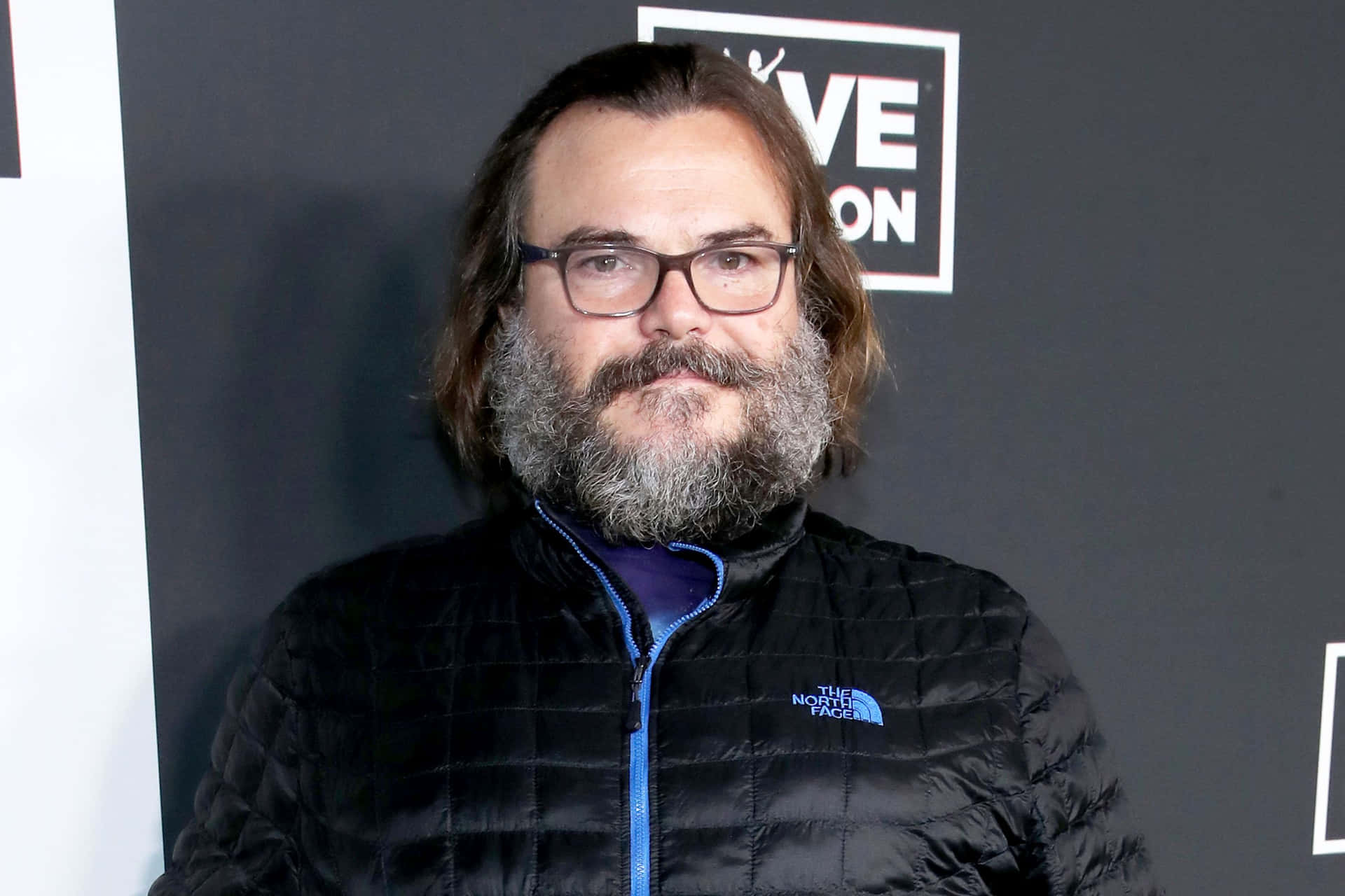 Jack Black Exhibiting Joy During A Red Carpet Event Background