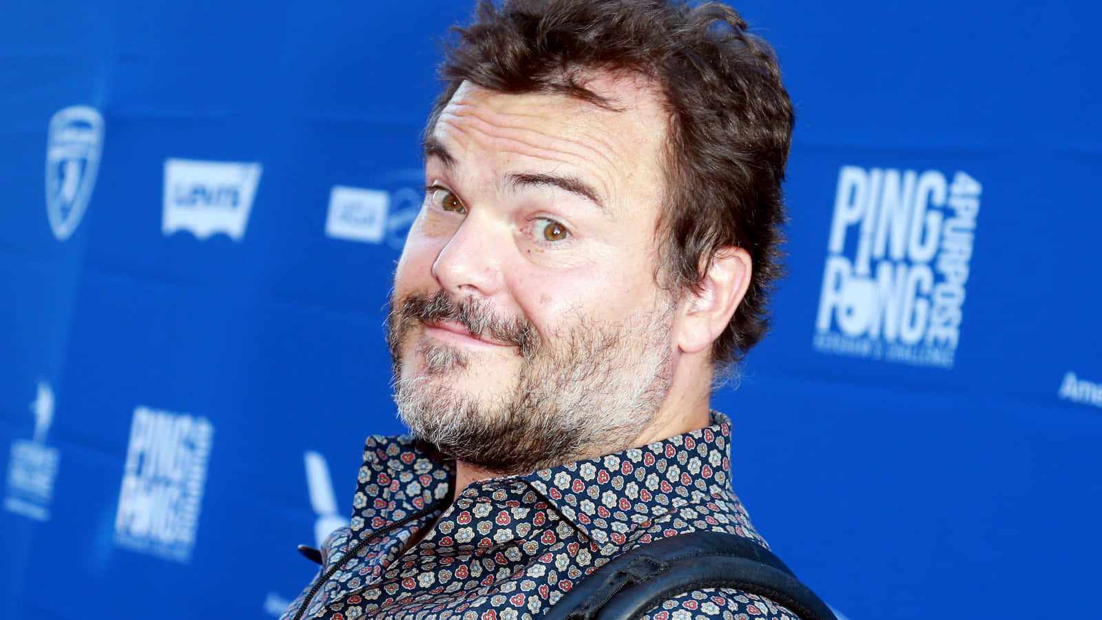 Jack Black Exuding Confidence In A Fun Pose Background
