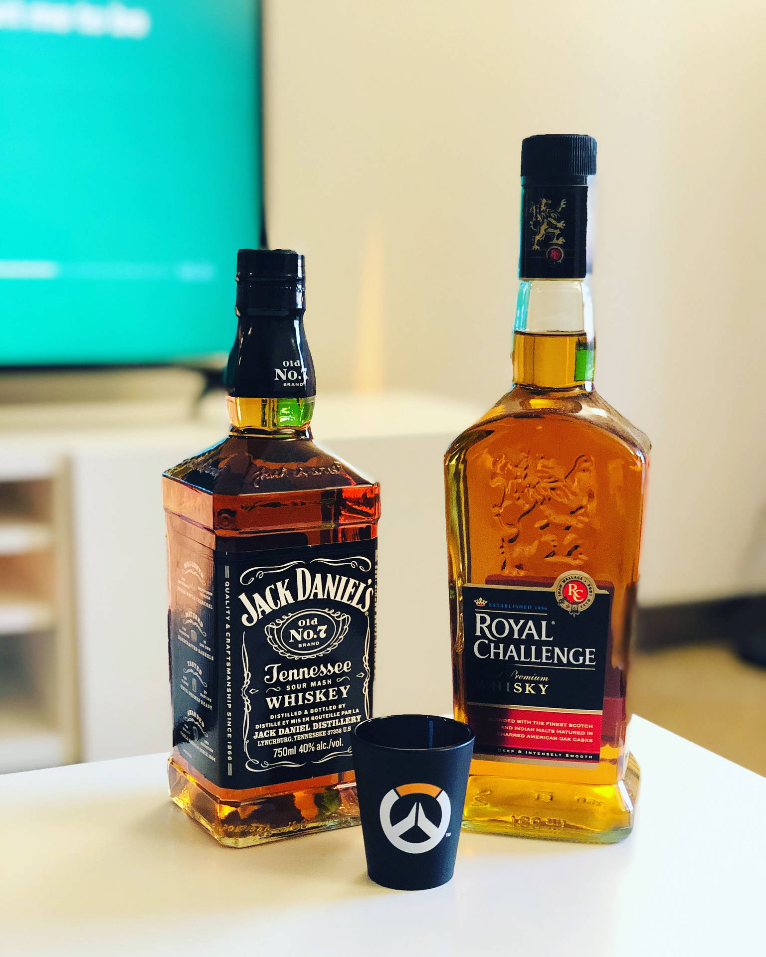 Jack Daniels And Royal Challenge Whiskey Bottles