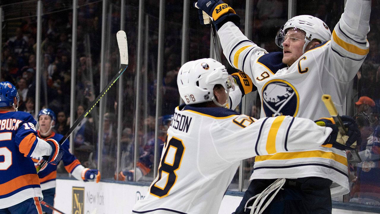 Jack Eichel Hugged Celebration Background