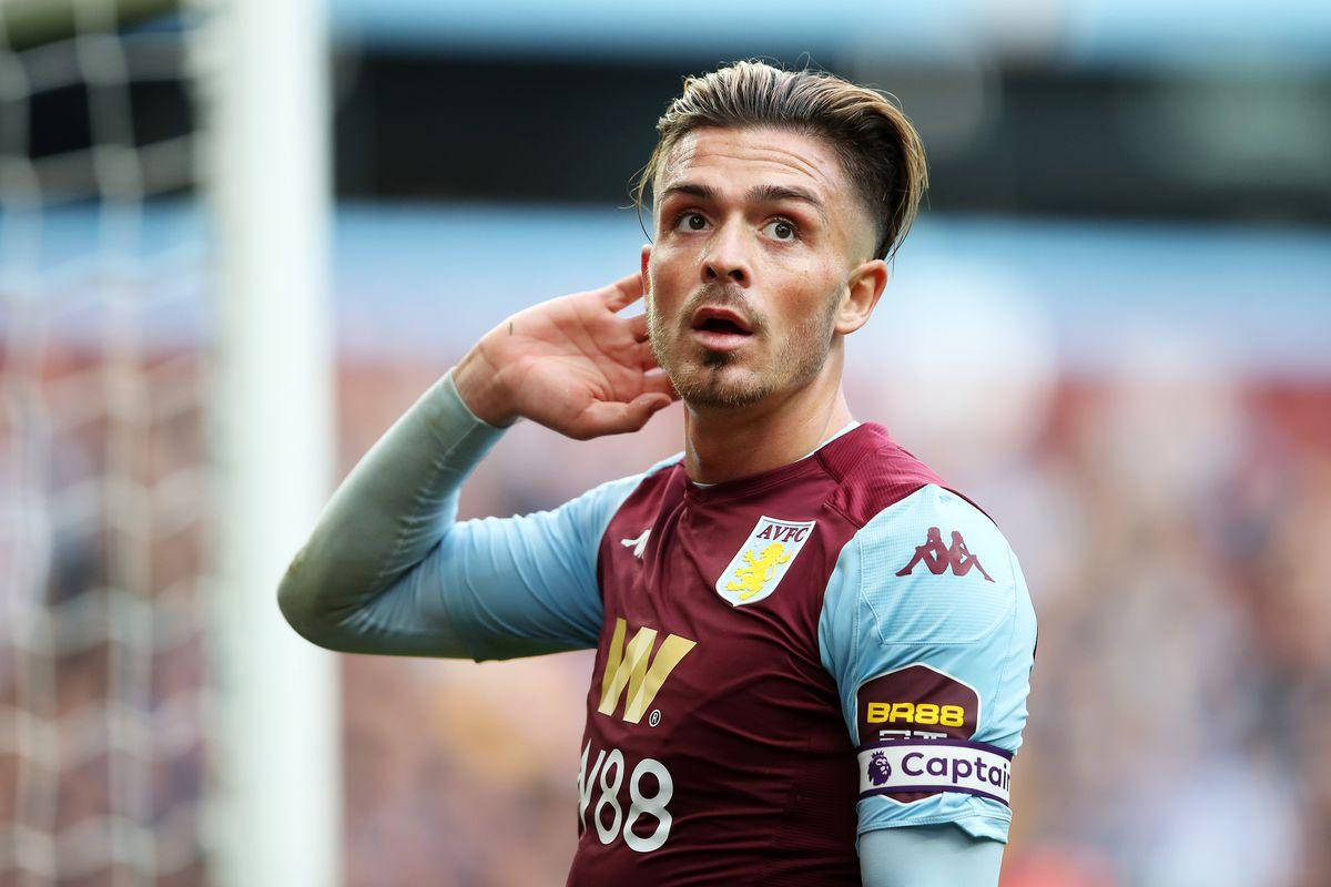 Jack Grealish Hand By Ear Background