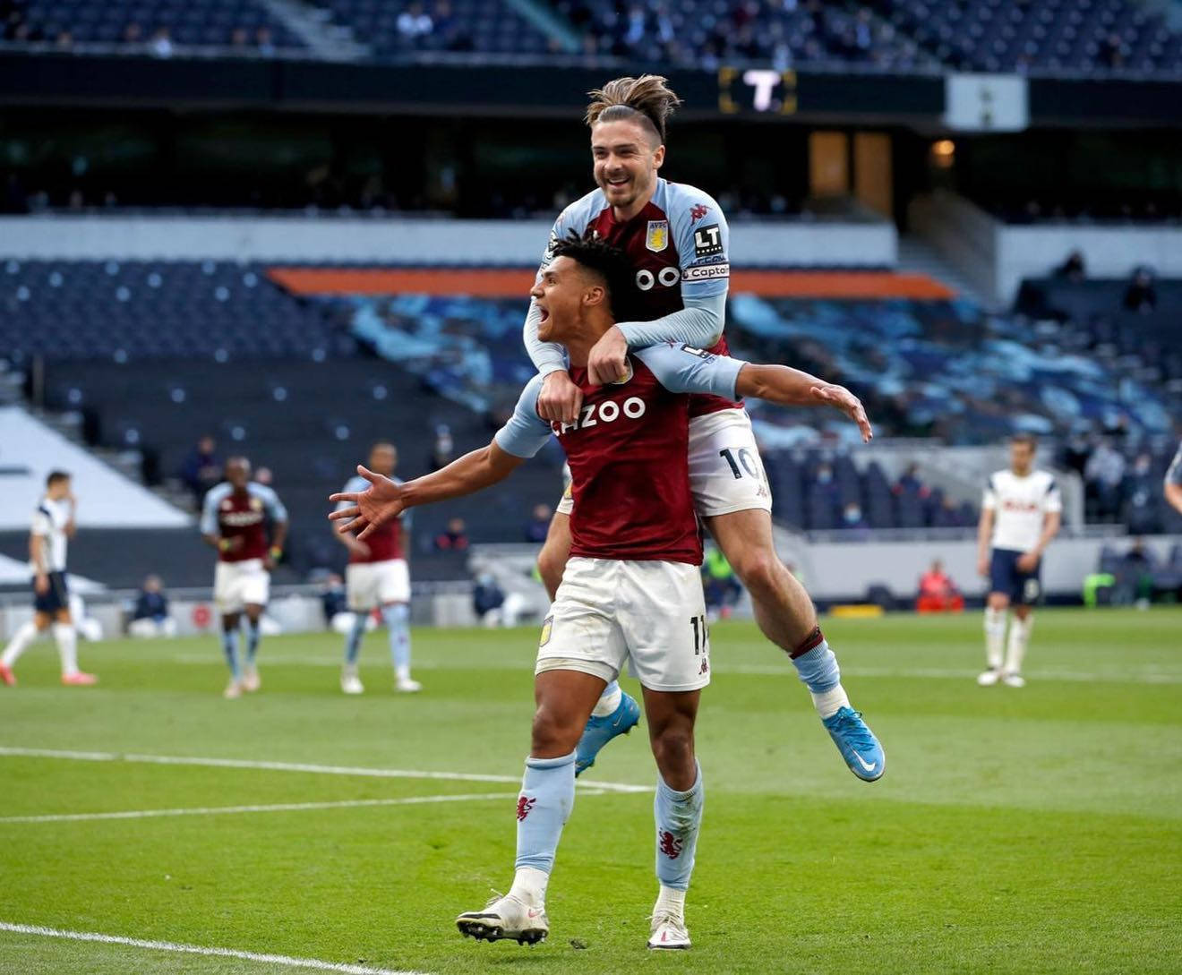 Jack Grealish Jumping On Ollie Watkins