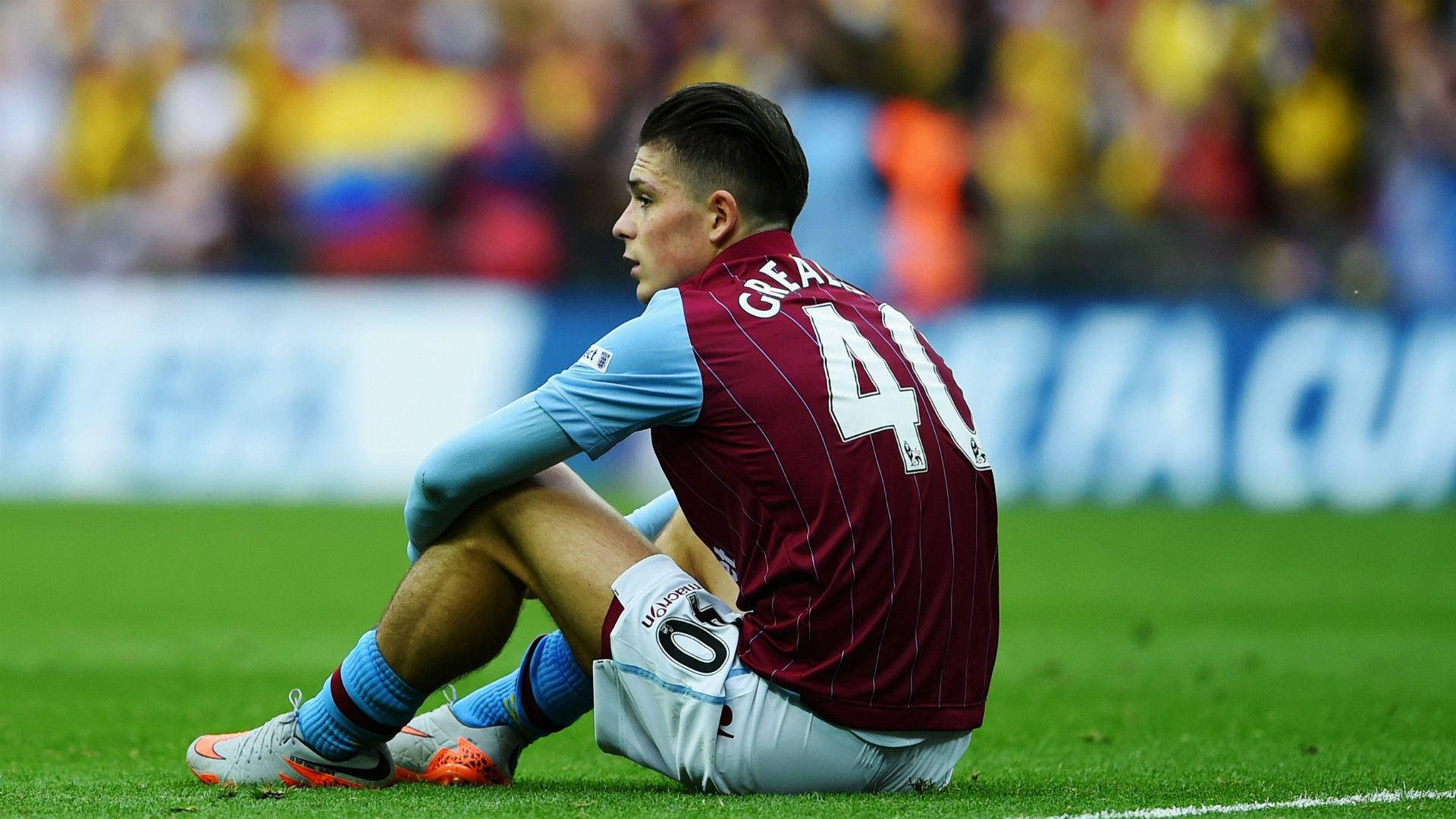 Jack Grealish Sitting On Ground