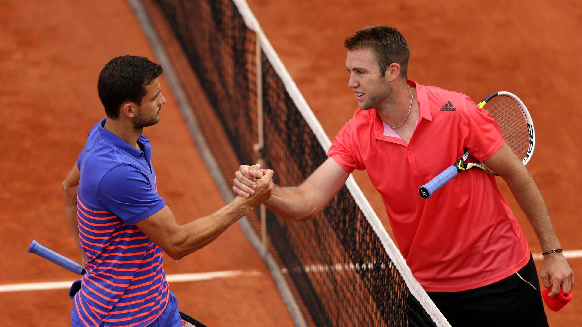 Jack Sock Displaying Amazing Sportsmanship On The Tennis Court Background