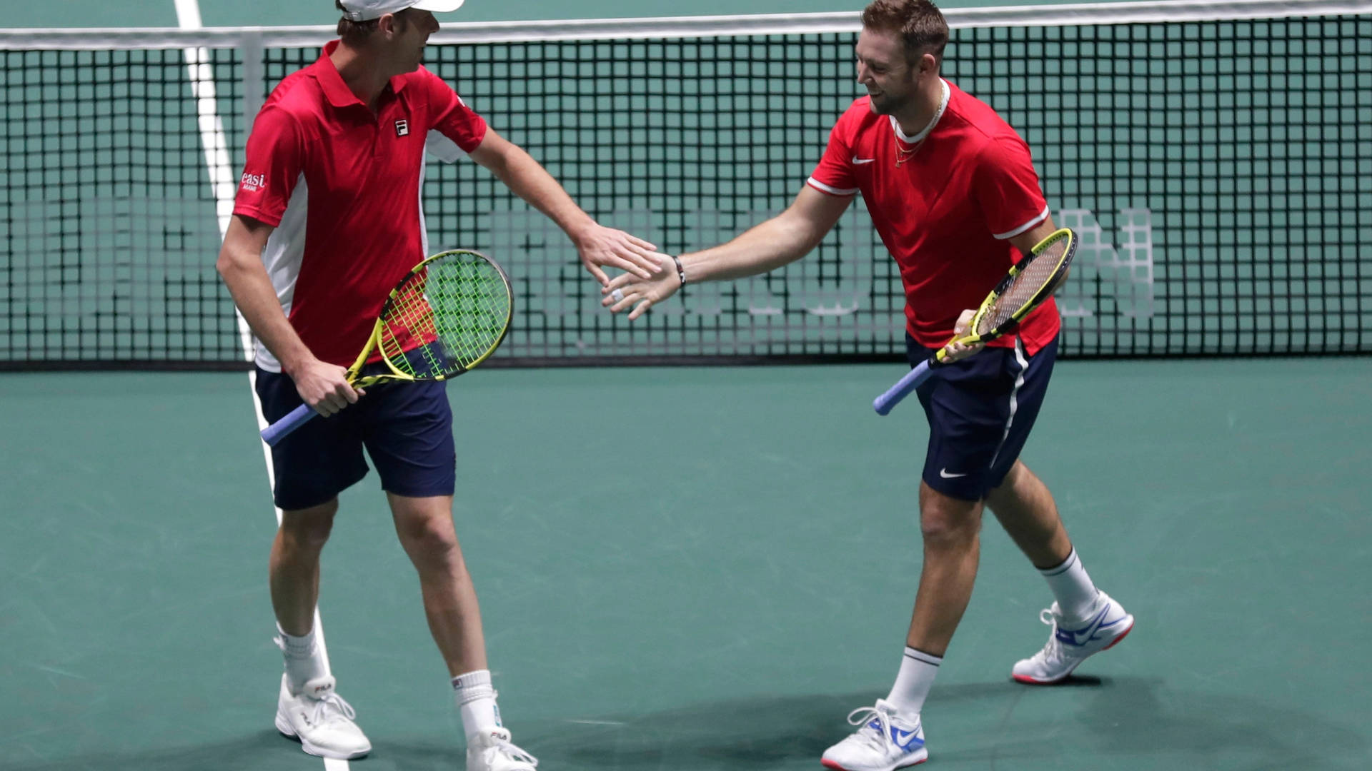 Jack Sock With Teammate Background